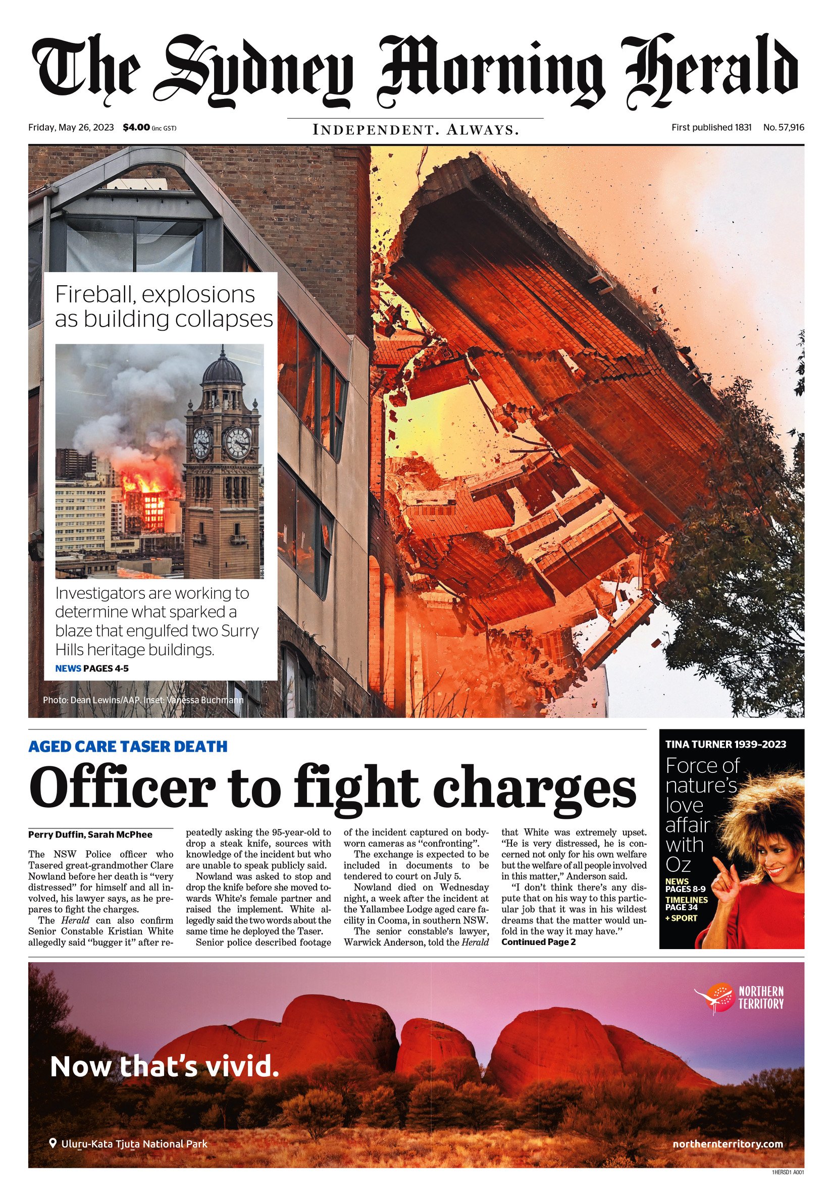 The front page of The Sydney Morning Herald newspaper, dated Friday, May 26, 2023. The main story covers a building collapse with an image of a burning building and a large section of a building falling. There is a smaller photo of a clock tower with
