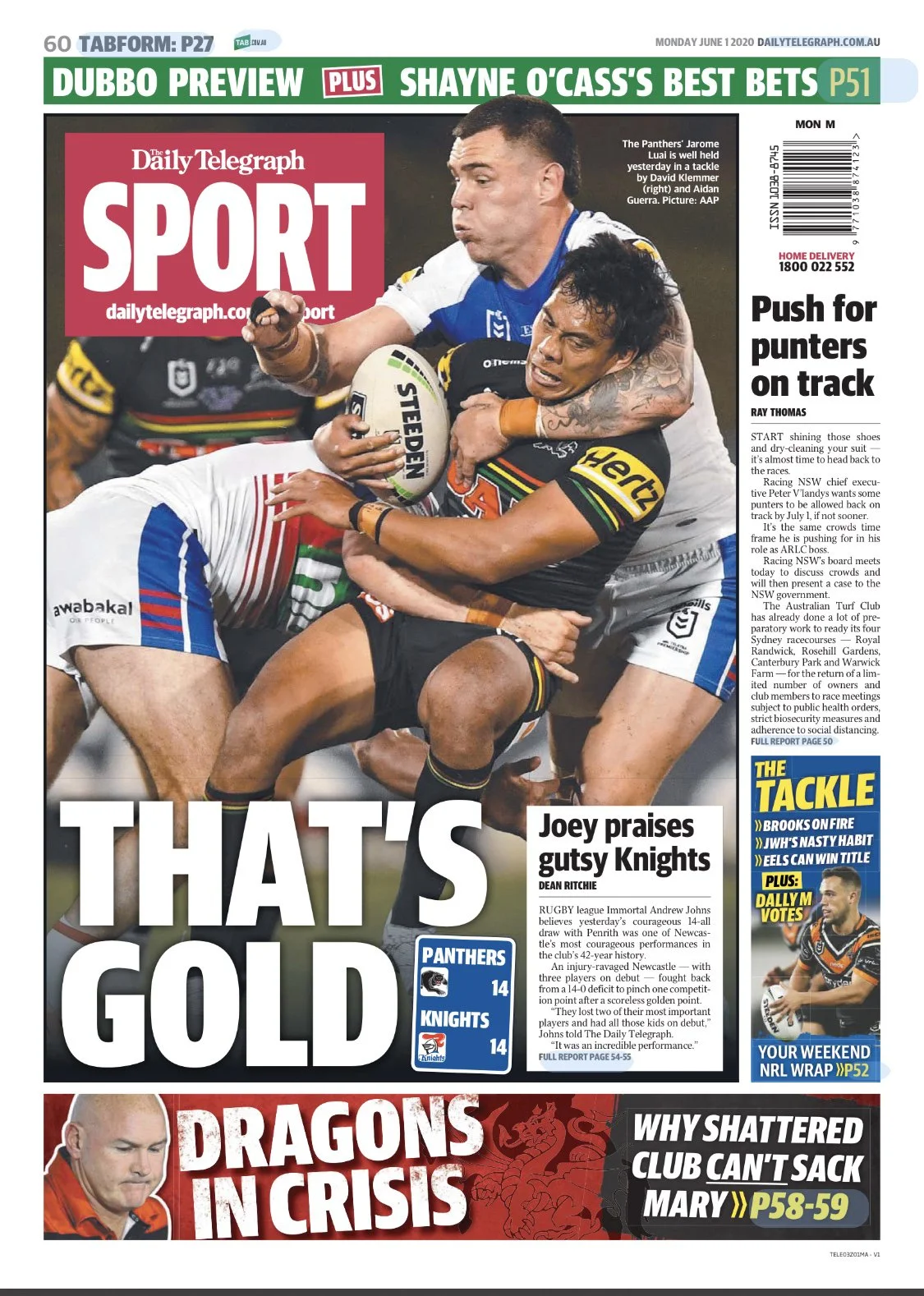 A rugby match with players from the Panthers and Knights competing for the ball during a tackle.