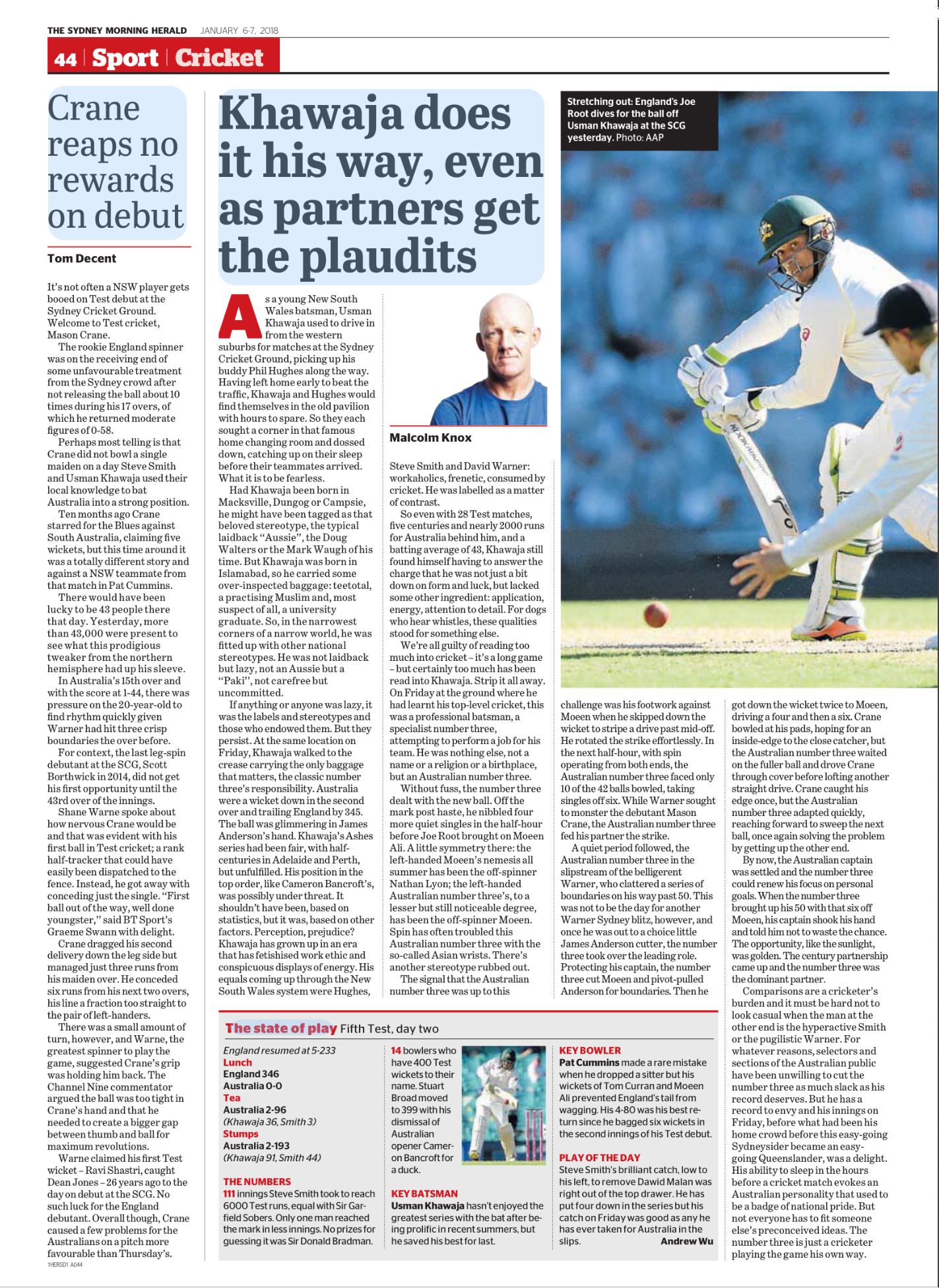 Newspaper sports article with a large photo of a cricket player in white uniform, wearing a helmet, and a wicketkeeper in gloves, on a cricket field. The headline reads 'Khawaja does it his way, even as partners get the plaudits.'