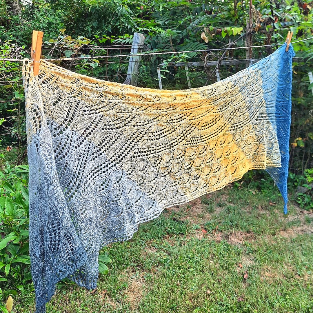 High Seas Shawl (pattern by @kieranfoley) knitted in one skein of ZEPHYR. 😀 Gorgeous lace design. Sample has 8 pattern repeats with 6/0 beads in the center of the large wave. Thank you Bitty for knitting this shawl. So pretty. The yarn is on our web