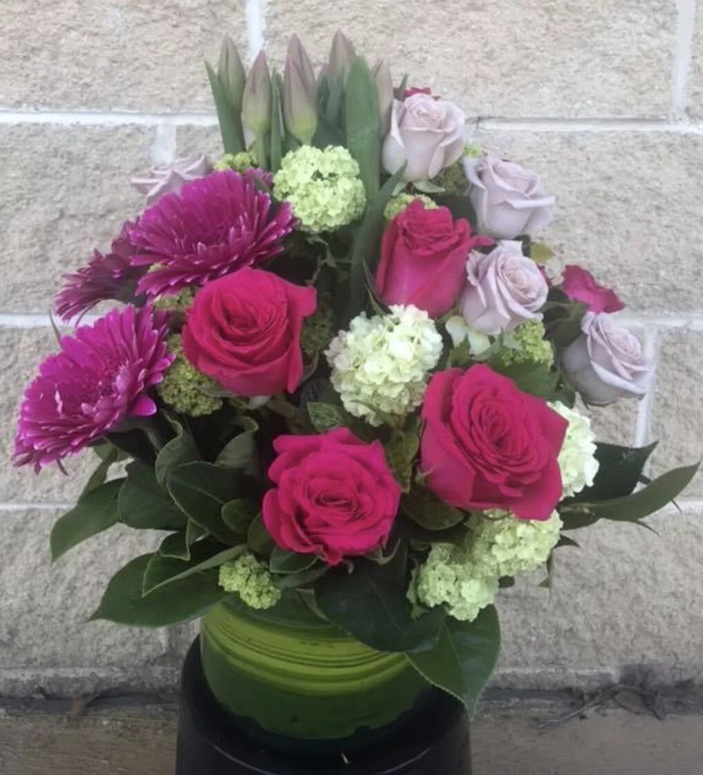 LILIAN - LEAF LINED GLASS VASE OF MIXED PREMIUM BLOOMS