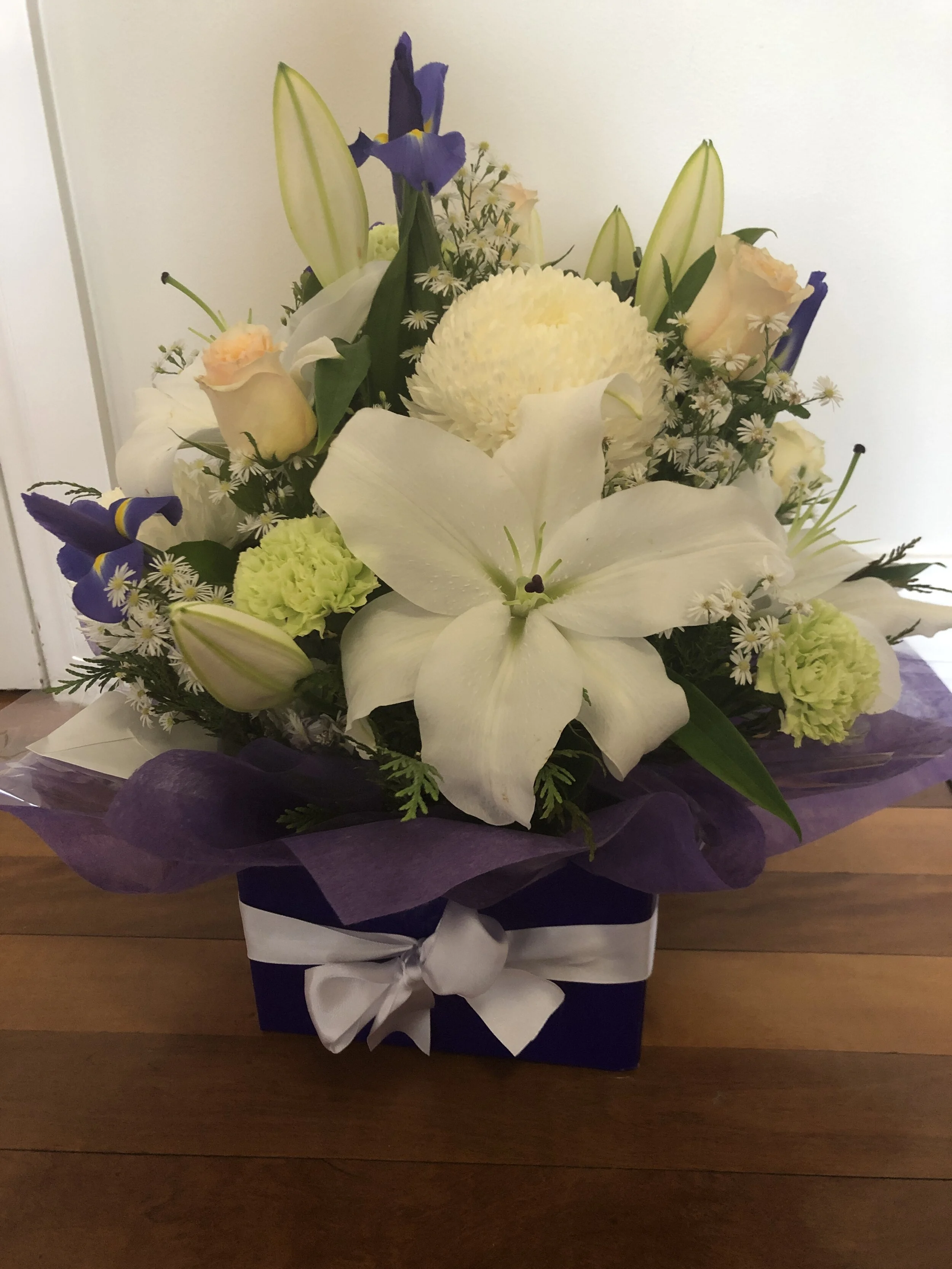 Box Arrangement Of Iris, Roses, Disbuds and Lilies
