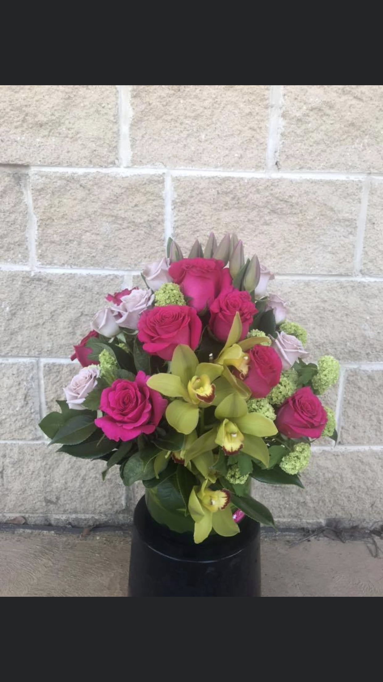 LILIAN - LEAF LINED GLASS VASE OF MIXED PREMIUM BLOOMS