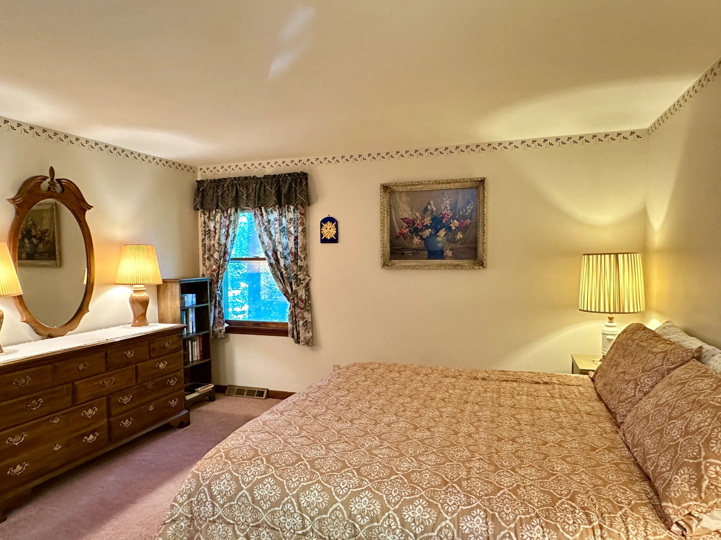 The 1st floor primary bedroom