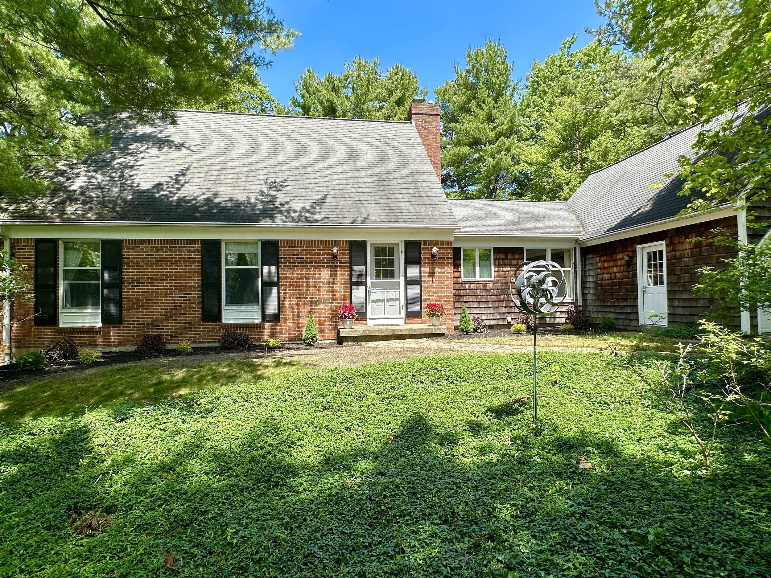 Lovingly maintained Henry Hager Cape Cod filled with warmth, character & timeless appeal.