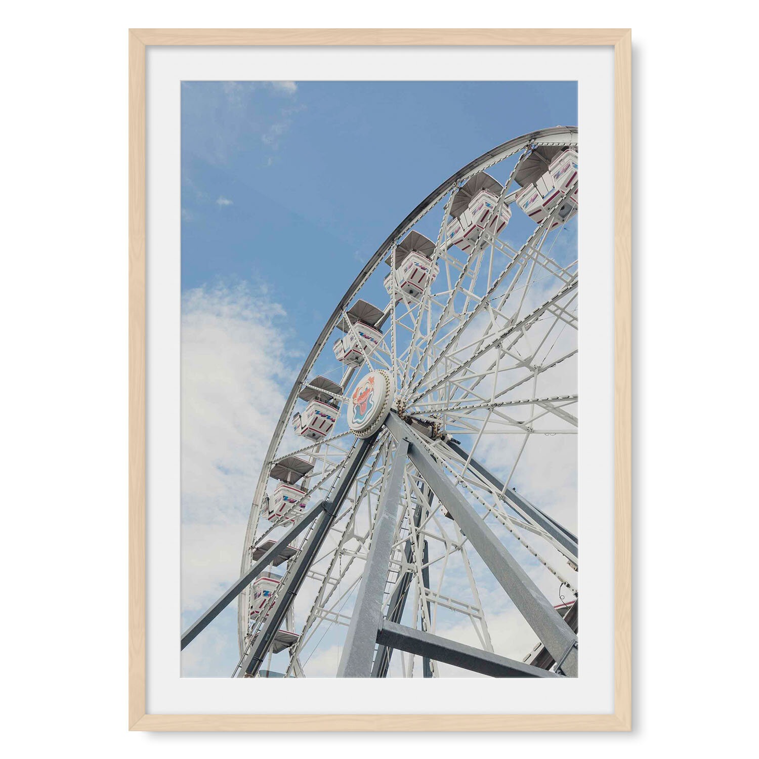 Light maple solid hardwood framed vertical fine art photography looking up at a white ferris wheel against a blue summer sky.