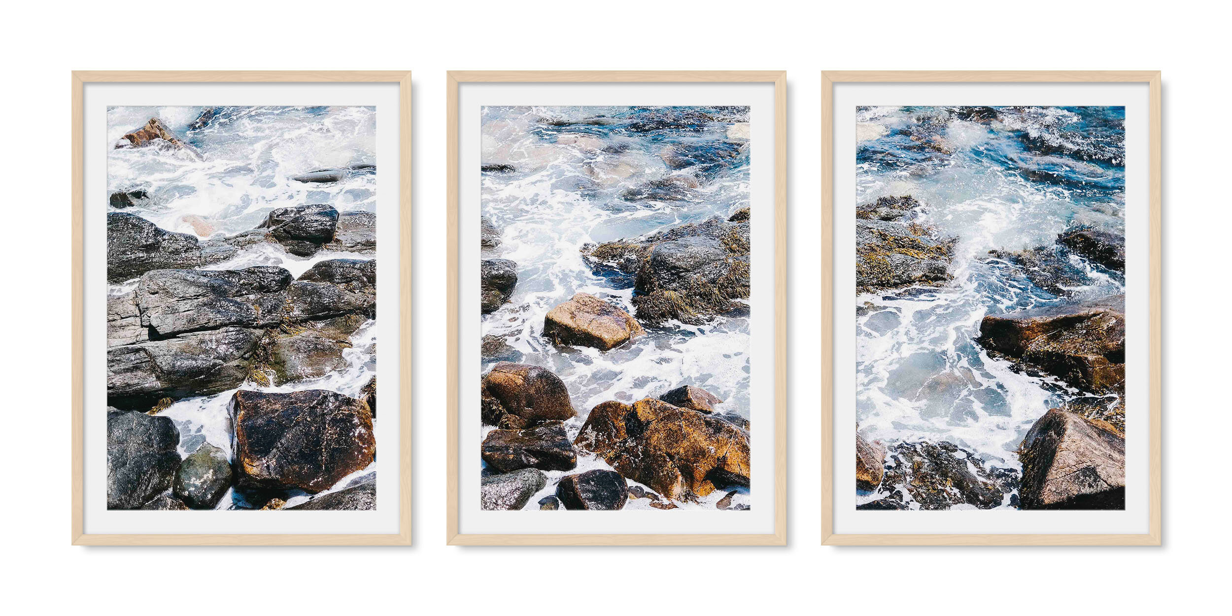Light maple solid hardwood framed triptych fine art photography of blue waves crashing on the rocky New England coastline.