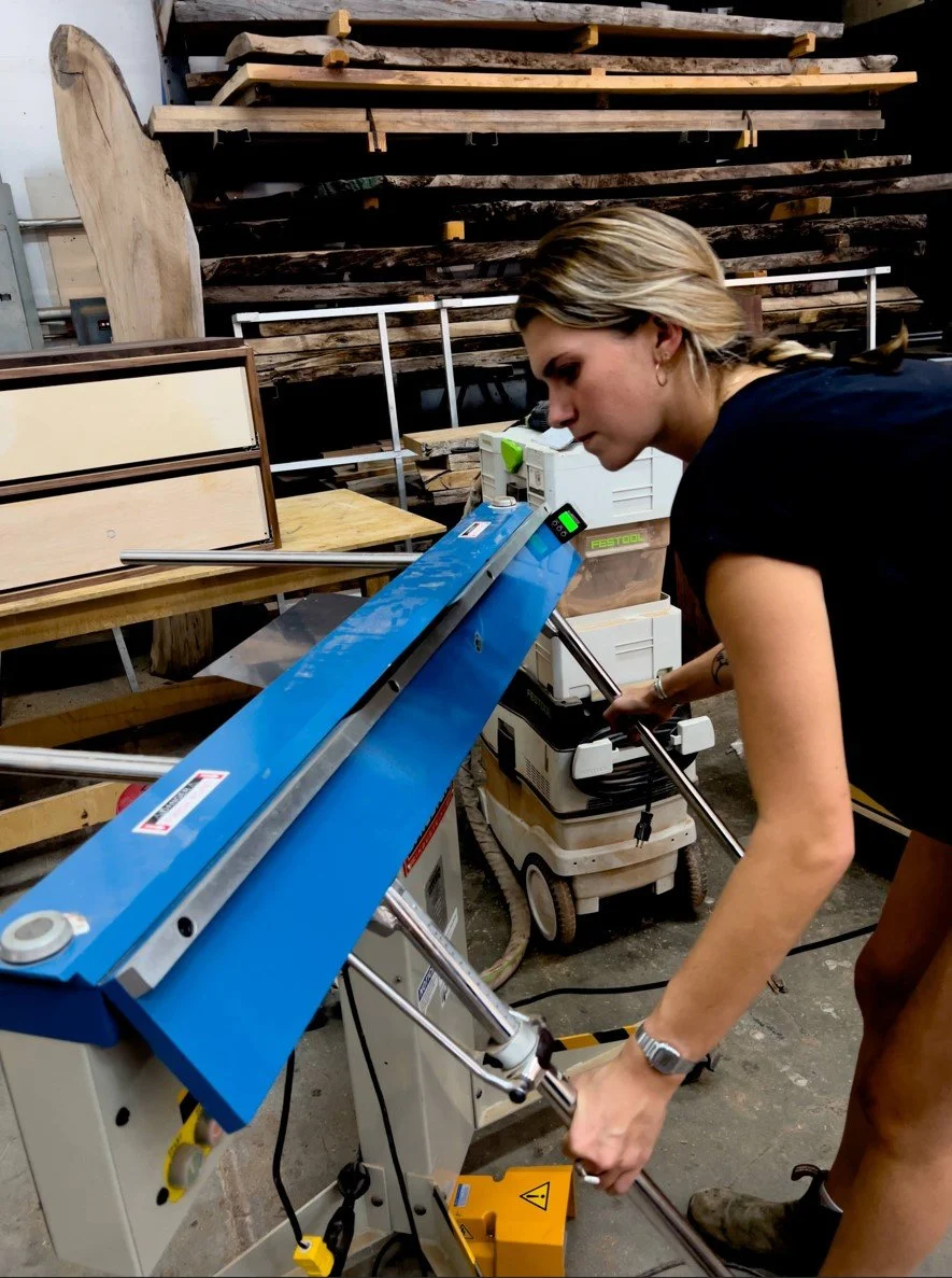 Ruby Dobbs using the Mag Brake to fold over 6000 unique stainless fresnel parts