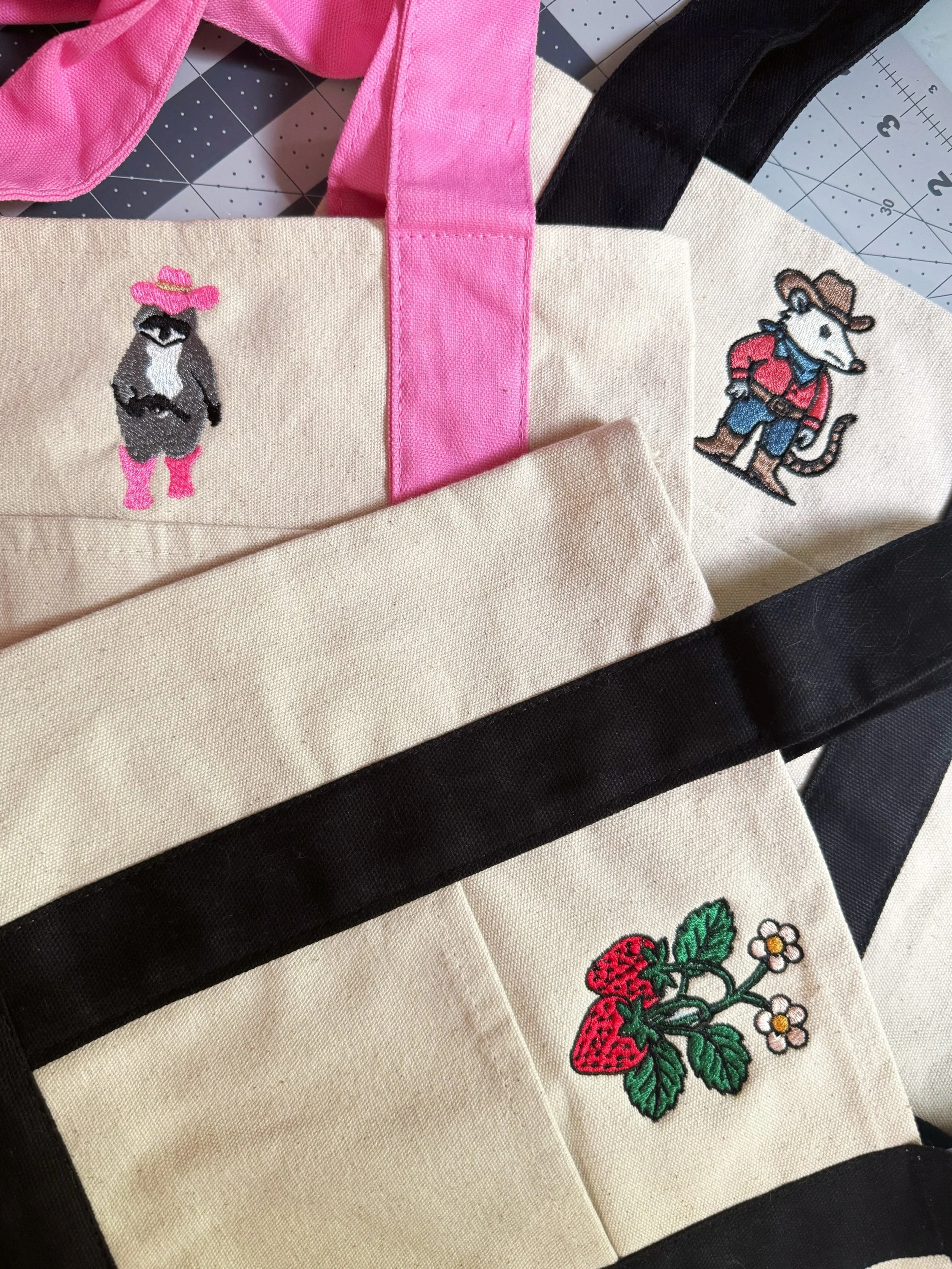 Totes I made recently 🤠🤠

I&rsquo;m planning a major shop update as soon as I get through my last Summer market. Get ready!!