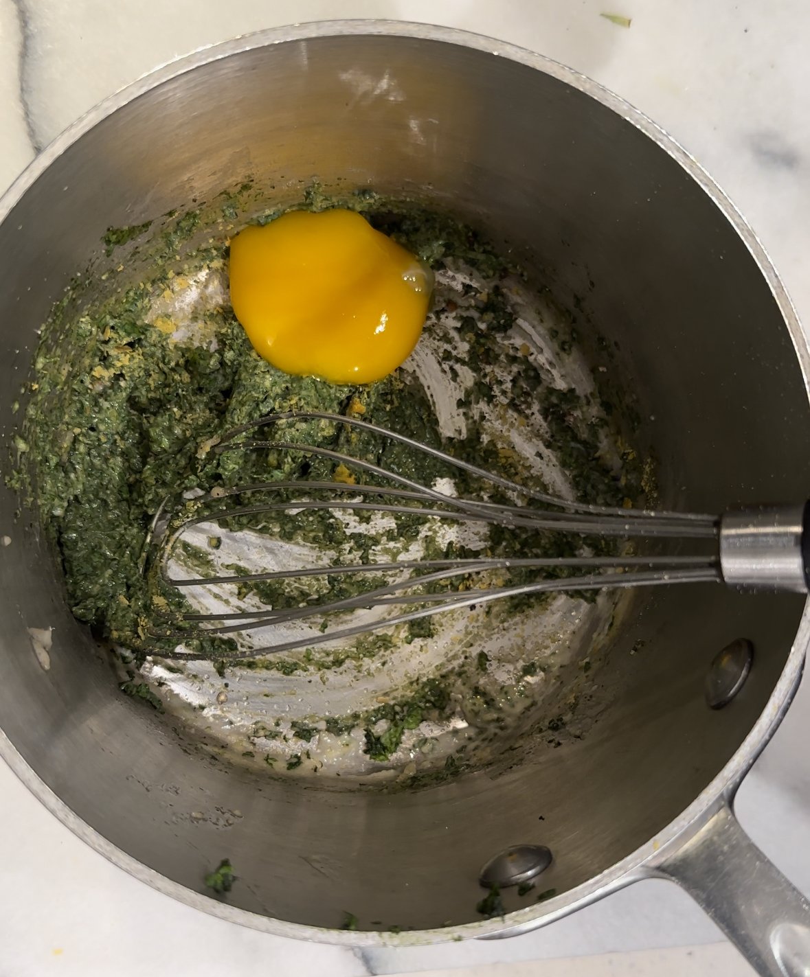 Stir in the yolk