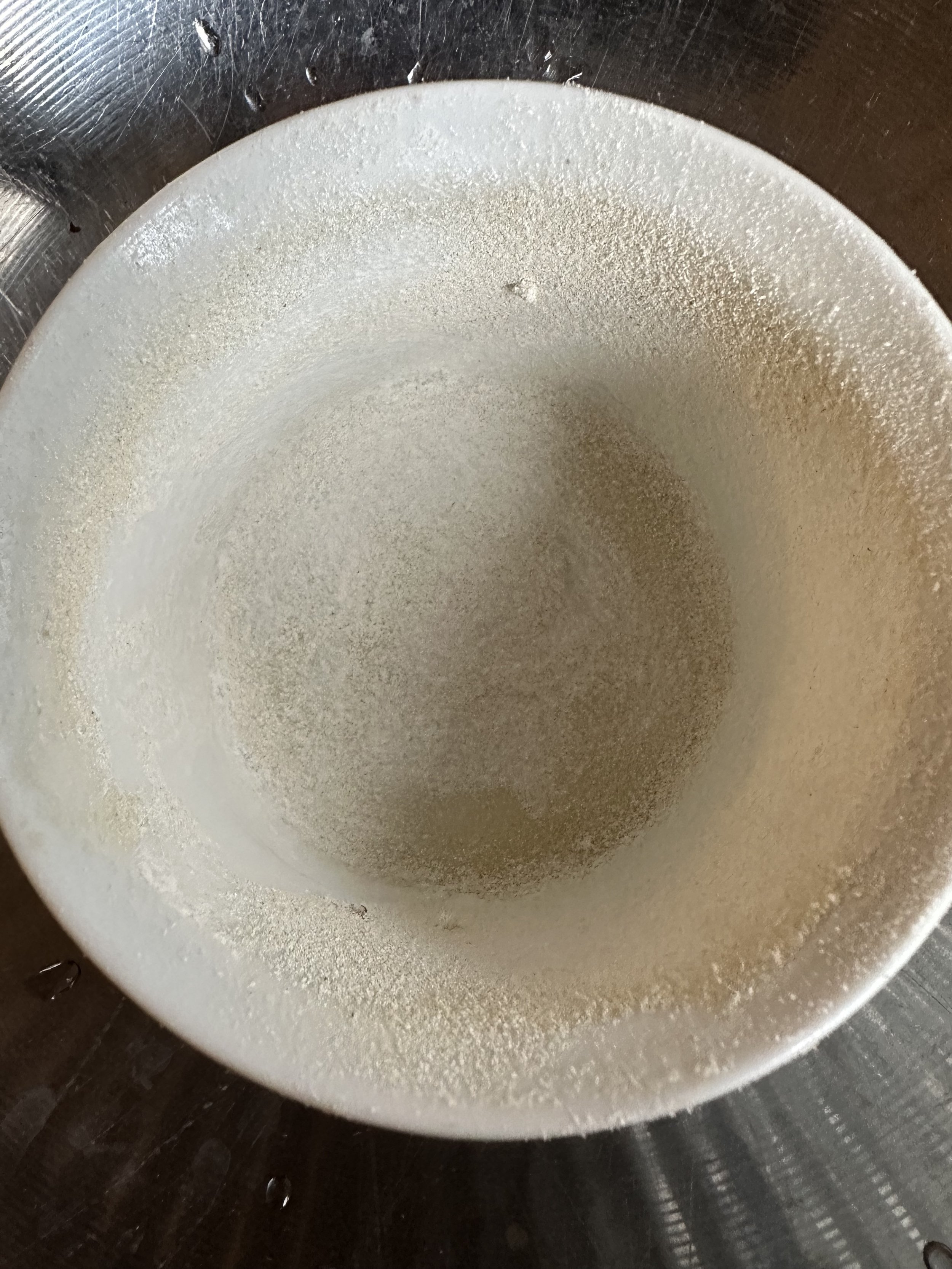 Oil + flour a souffle dish
