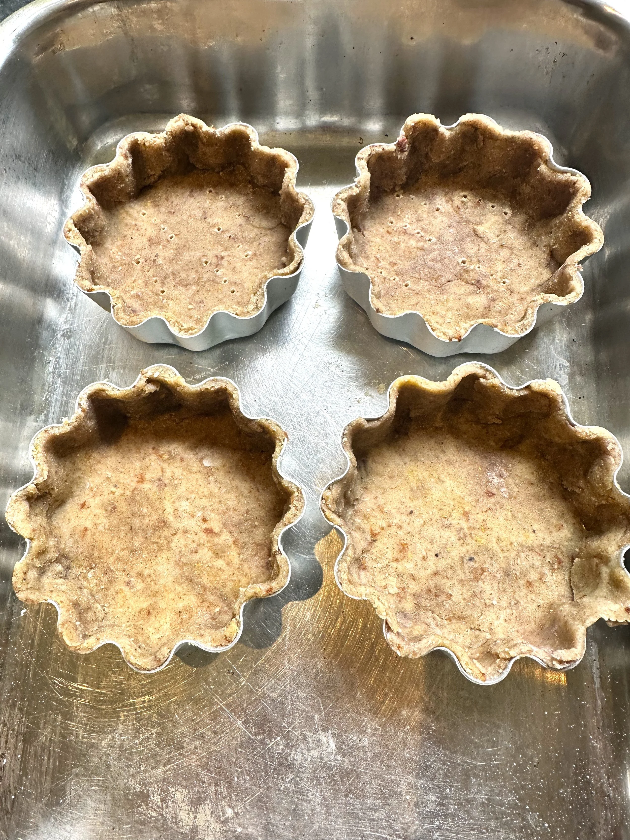 baked tart shells ready for jam