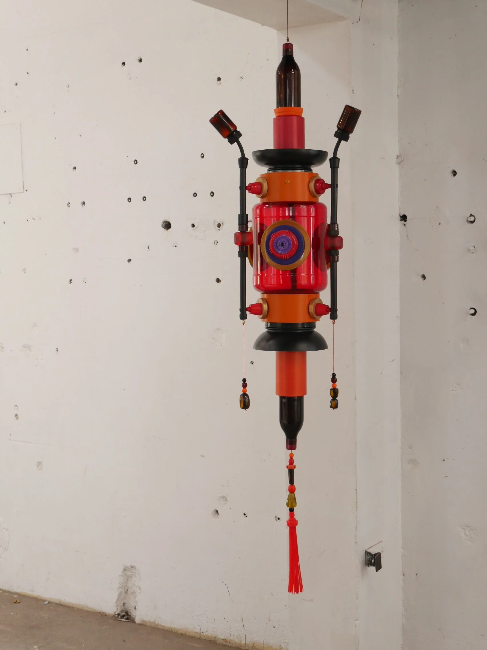 Reverence,2018, assembled plastic waste shrine. This sculpture has been constructed from a collection of plastic objects from my own life and from those arround me, it reflects the many ways plastics are used in our modern lives. 