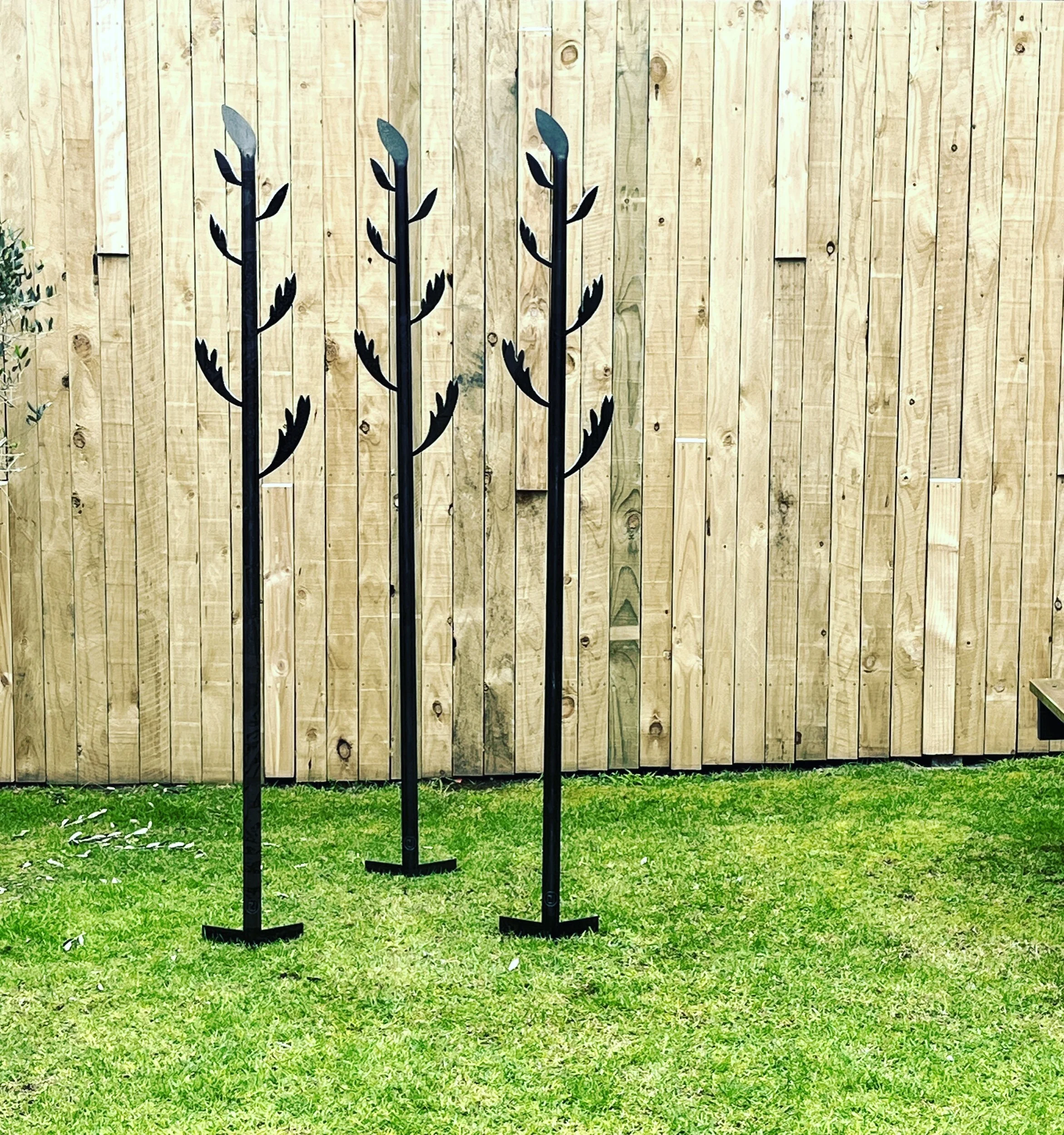 Korari TOtem motif garden art by Claire Jensen Opunake, New Zealand.