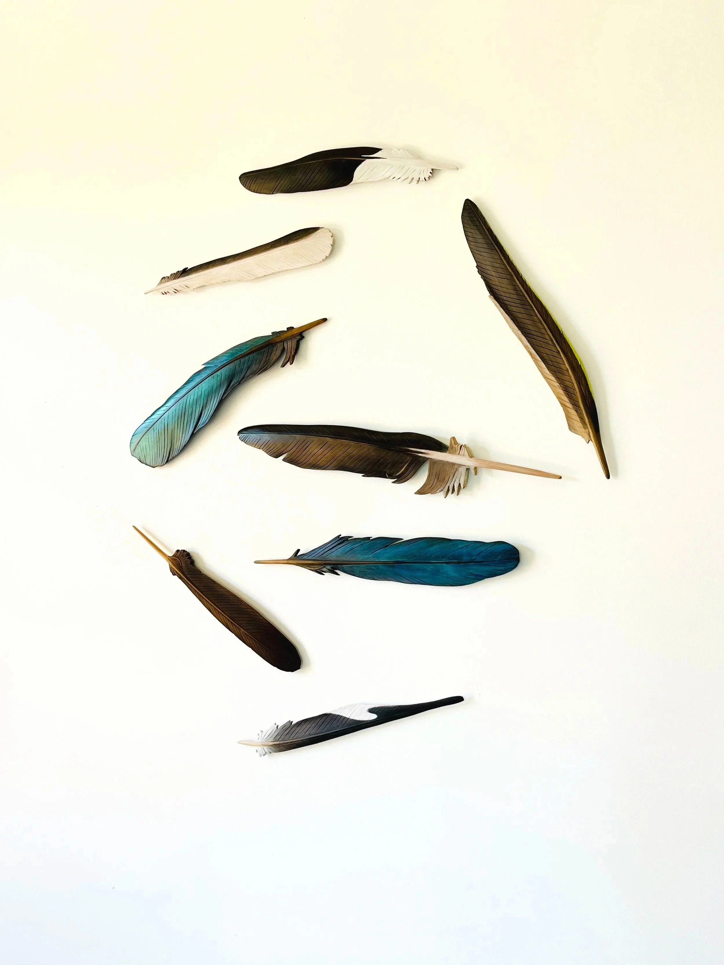 The Sky Above carved feather installation 2025. 