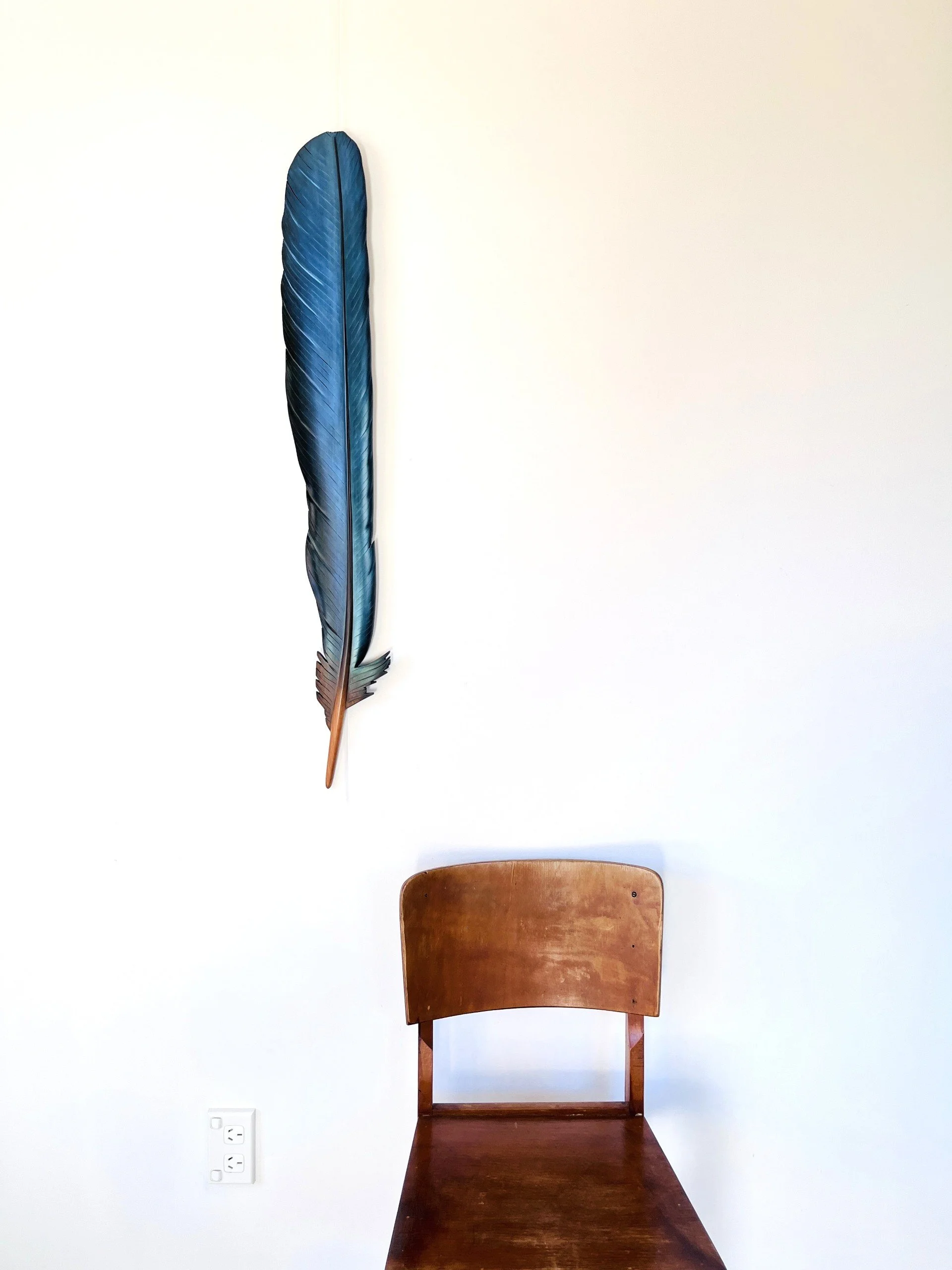 tui-feather-wall-art-carving-claire-jensen.jpg