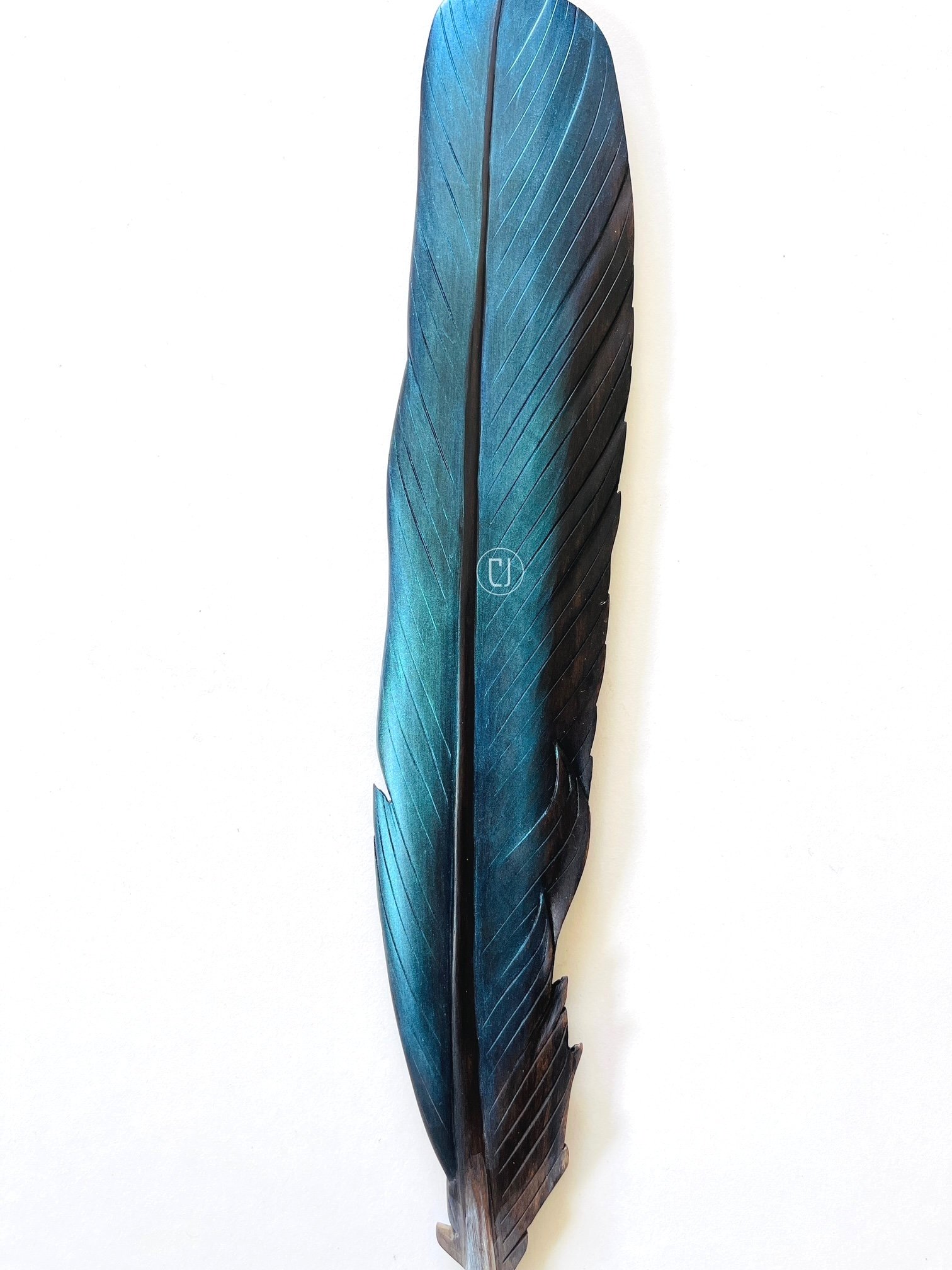 detail+of+kingfisher+feather+carving+by+Claire+Jensen+NZ+artist.jpg