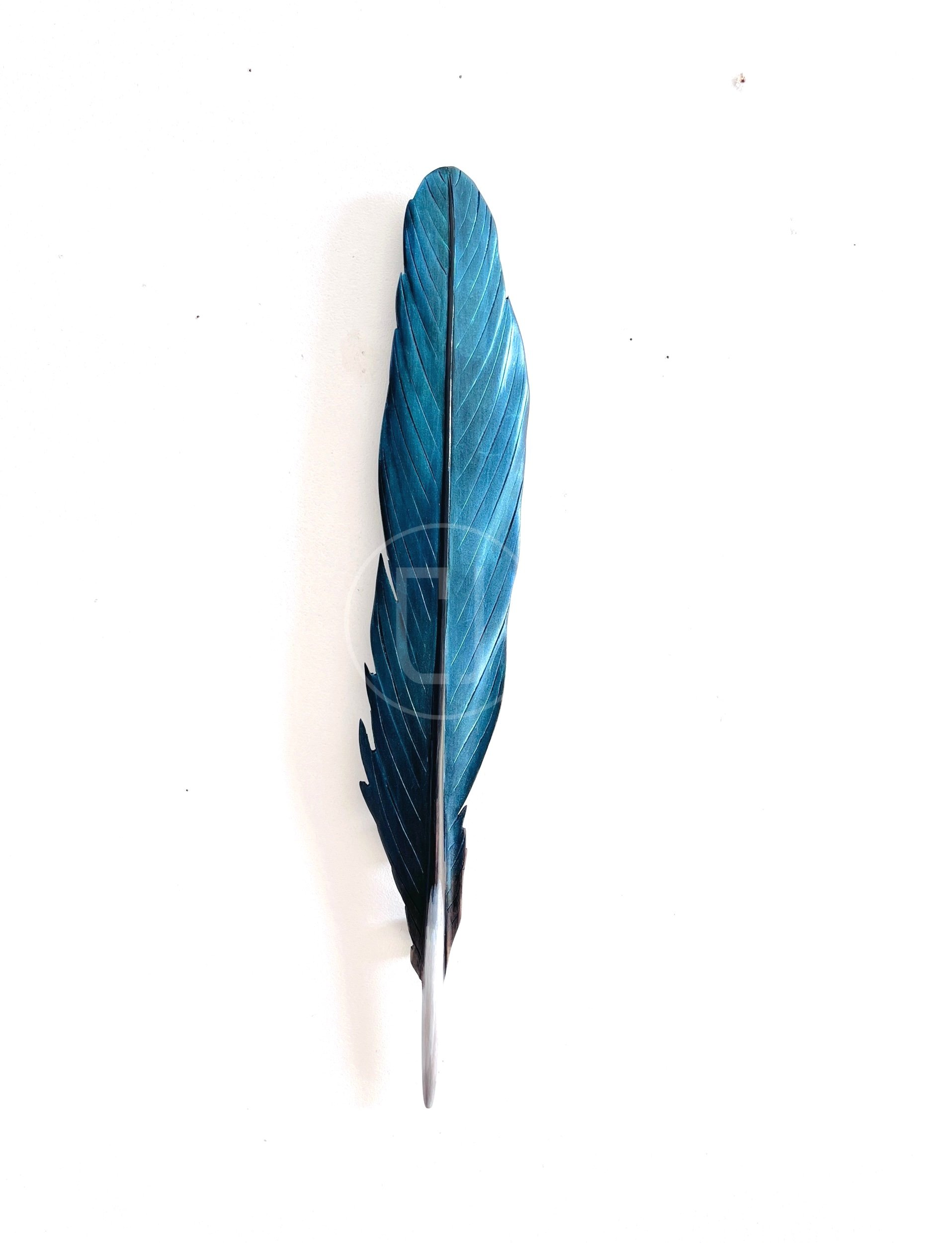 kotare feather carving made in Taranaki by Claire Jensen.