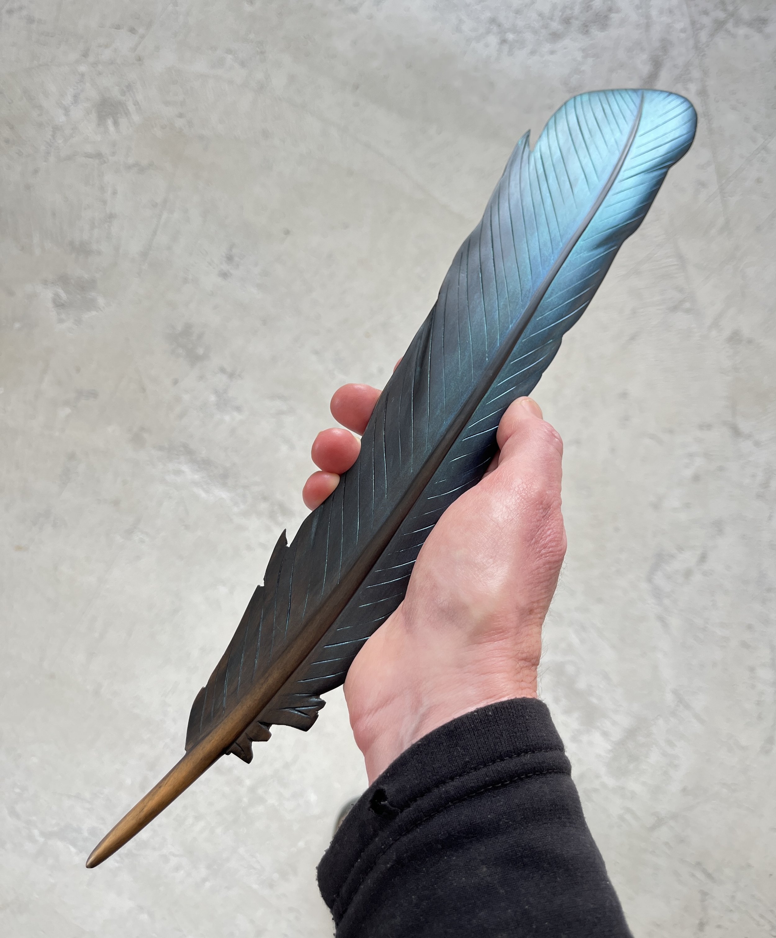 iridescent blue tui feather art by claire jensen.jpg