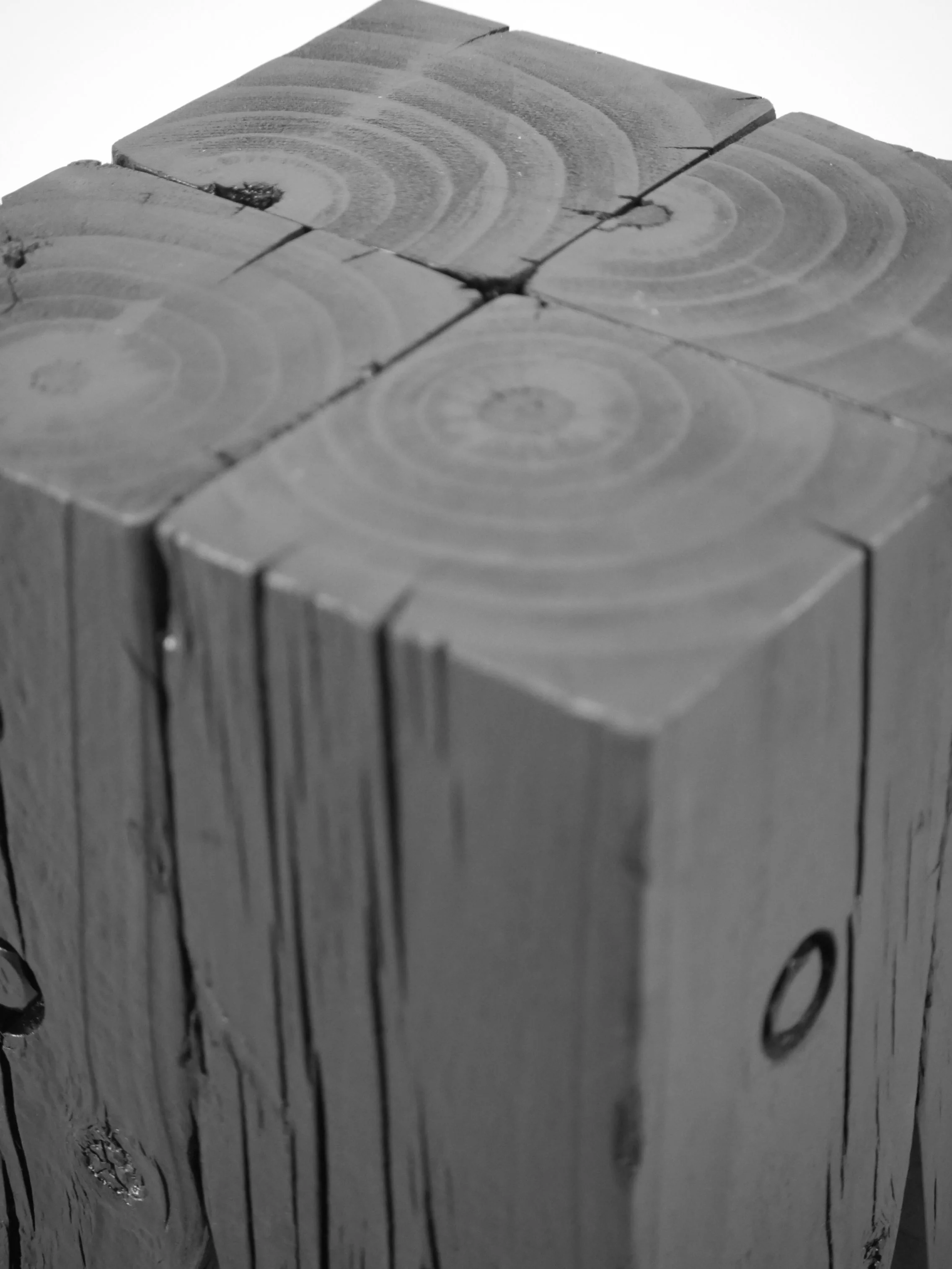 Detail of blackened block stool, 2017.