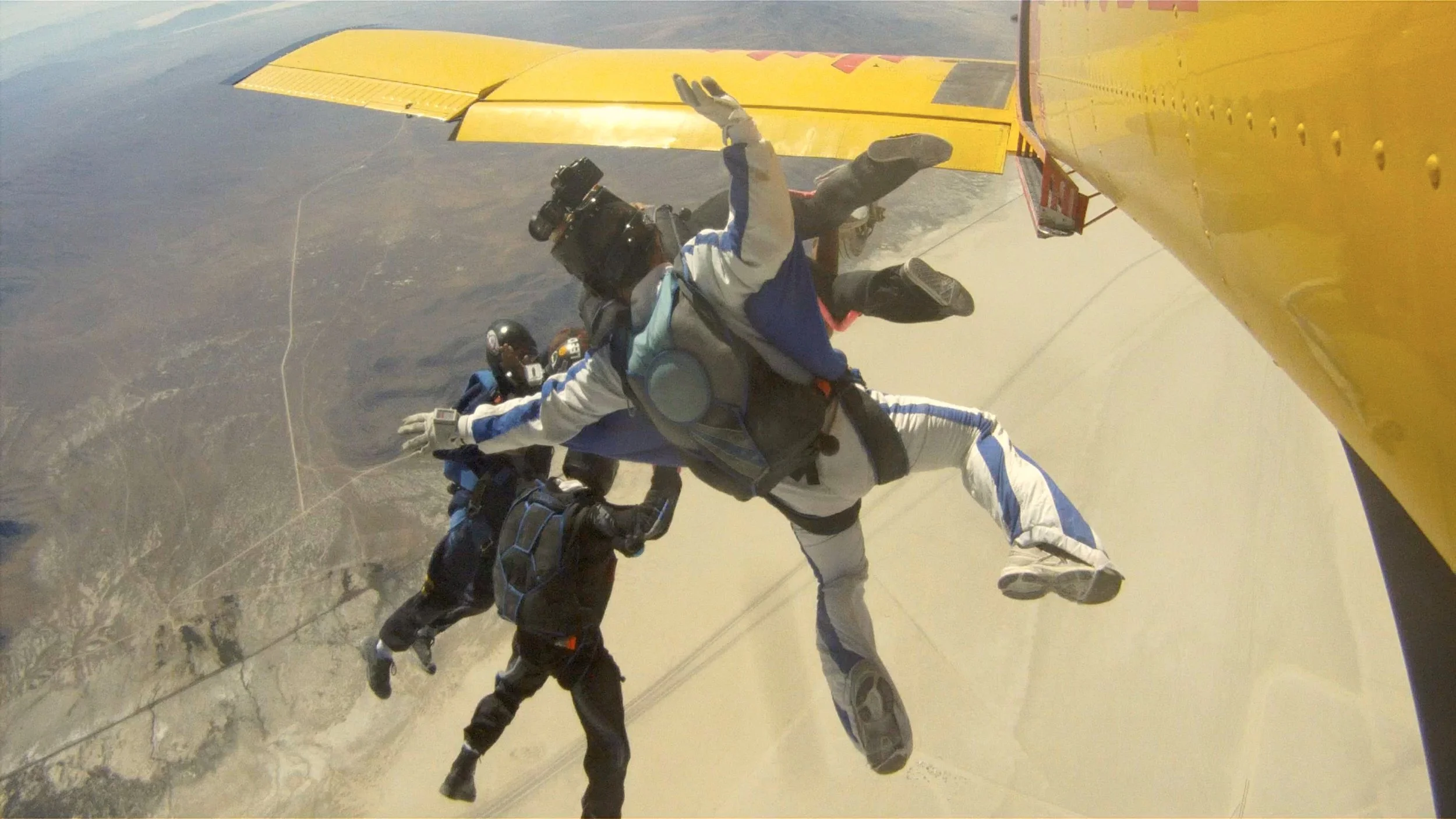 Skydiving into Burning Man. 