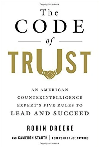 Book cover titled "The Code of Trust" by Robin Dreke, with subtitle "An American Counterintelligence Expert's Five Rules to Lead and Succeed".
