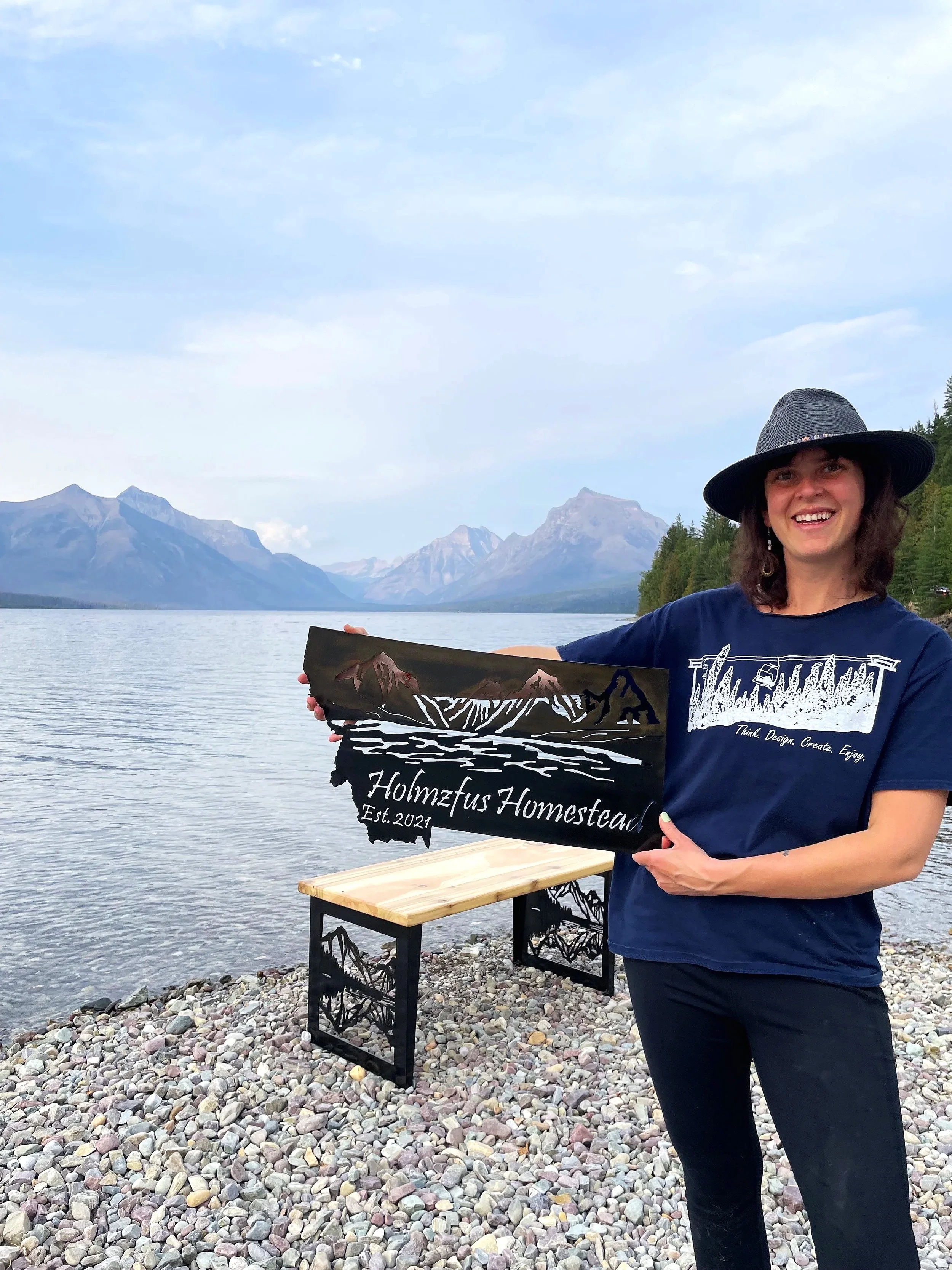 Kelsey+At+Lake+McDonald+in+Glacier+National+Park+with+Custom+metal+Montana+mountian+sign.jpg