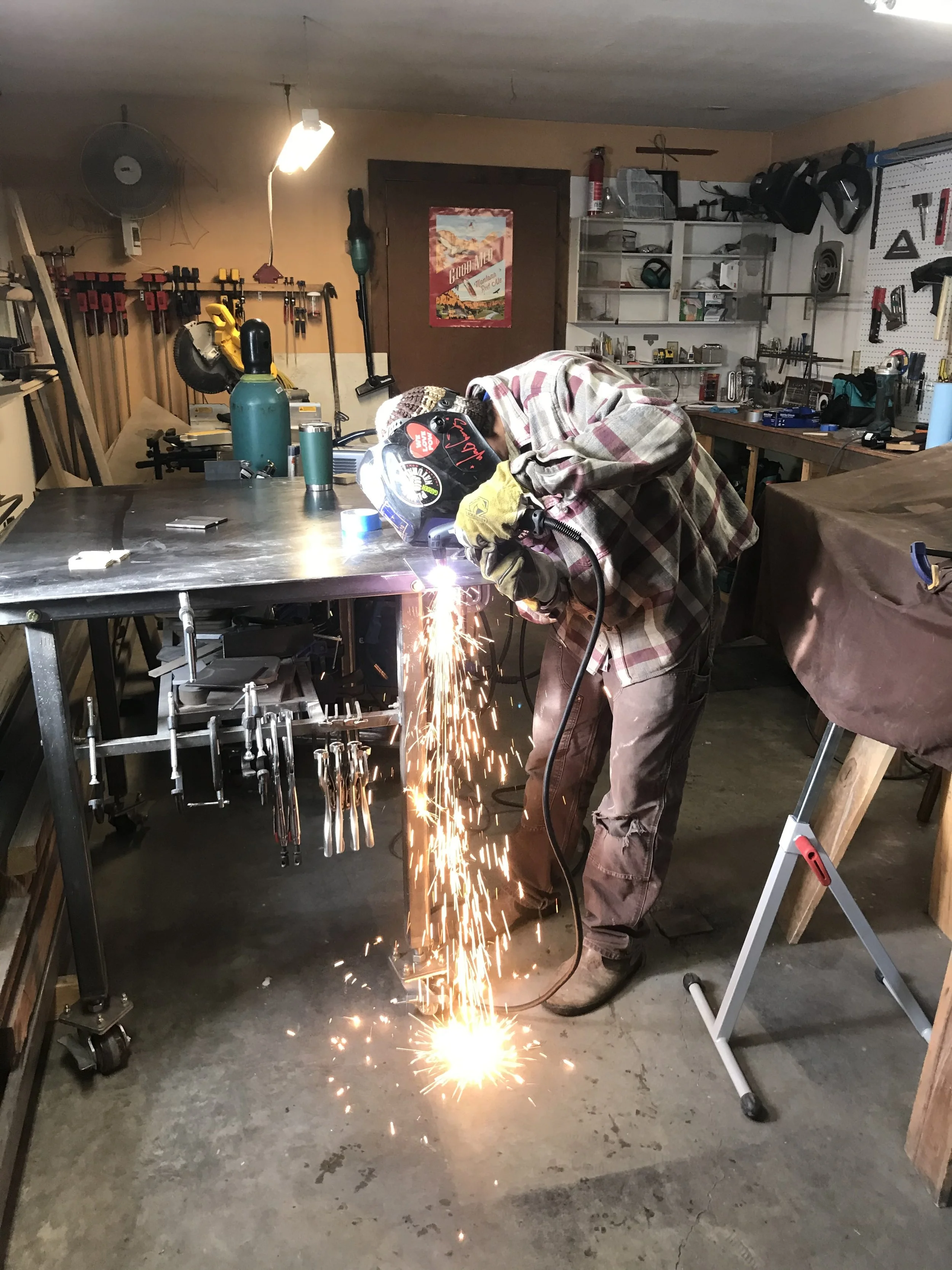 Owner Nate in Original Glacier Metalwork Shop.jpeg