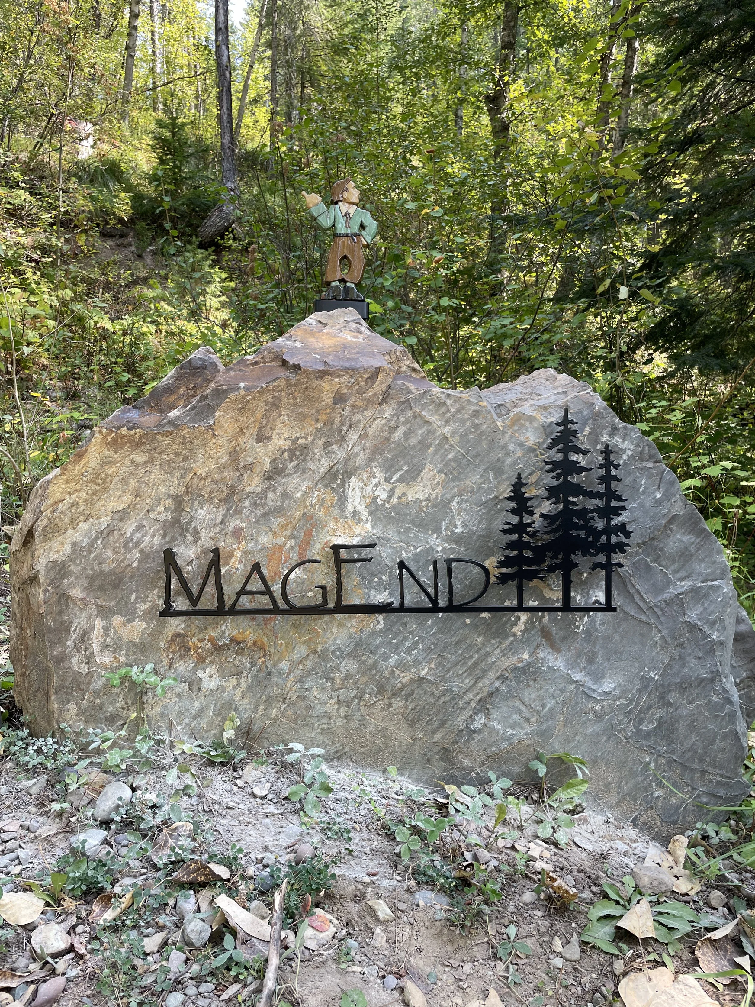 Custom metal address rock house sign with tree design, finished with a black powder coating finish.