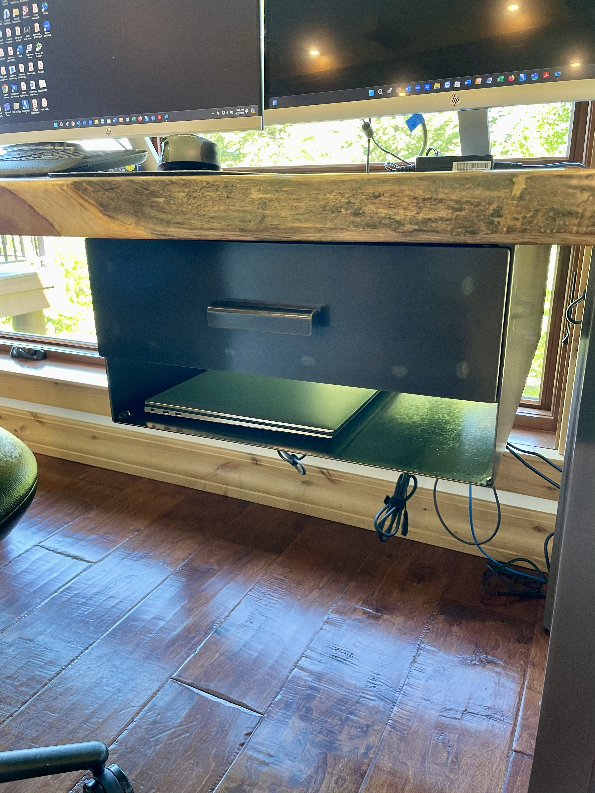 Hand made custom blue pine slab and steel leg desk close up of under-mounted steel draw and tuck away spot, designed and hand crafted by Creative Combinations Montana.  
