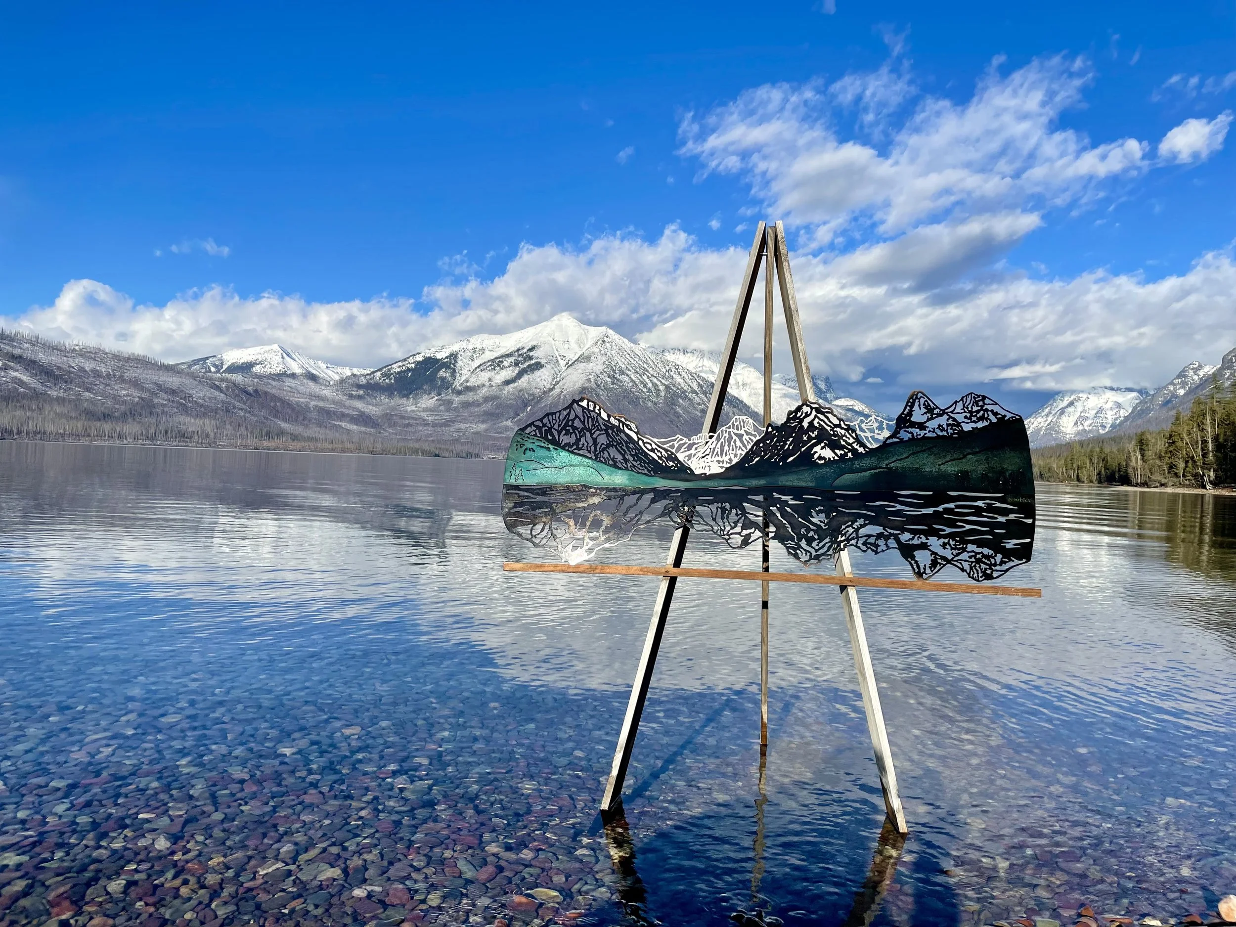 Lake McDonald Mountains triple layer metal wall art on the shore of Lake McDonald in Glacier National Park.