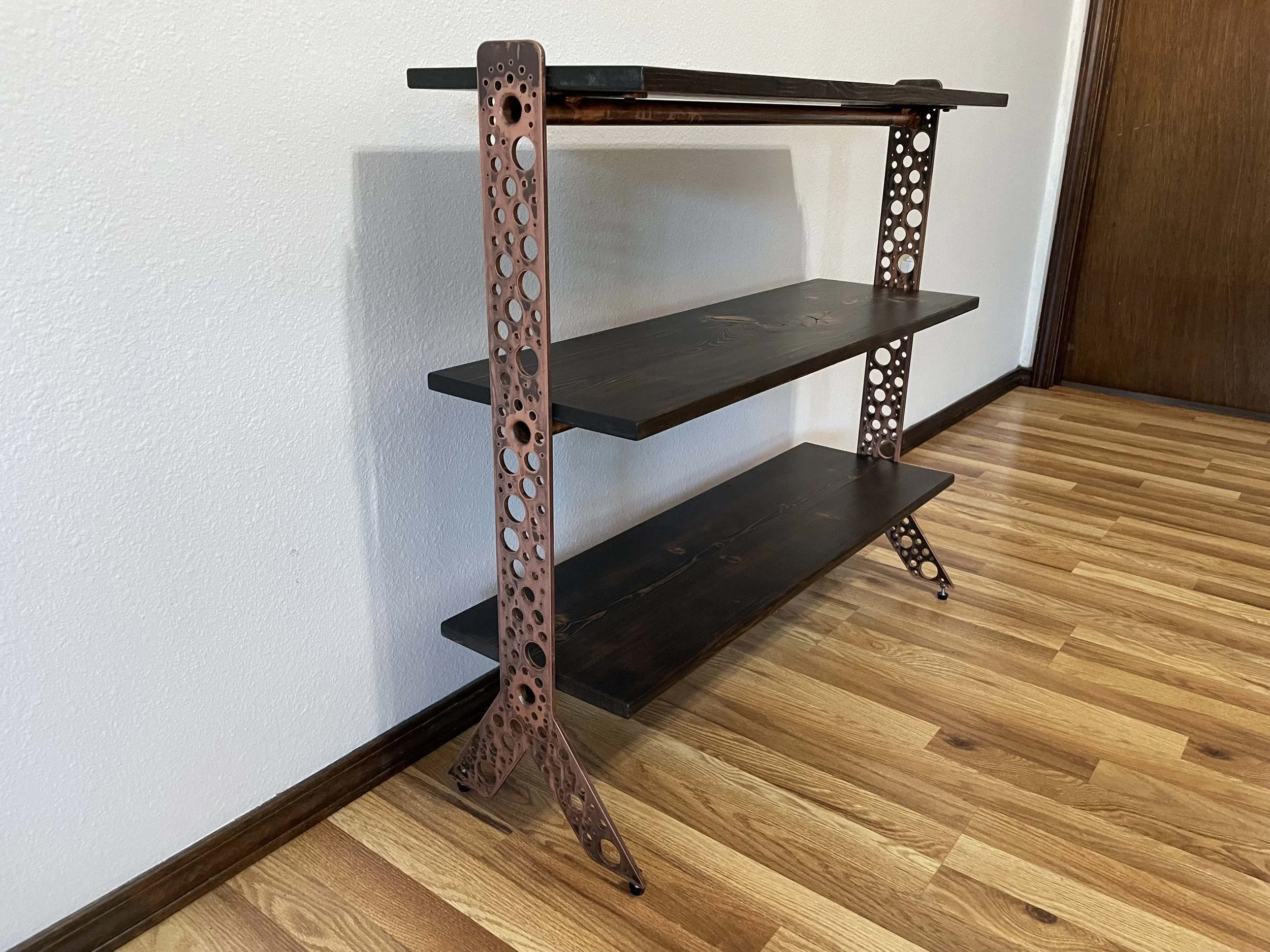 Hand made reclaimed wood and steel book shelf designed and hand crafted by Creative Combinations Montana.