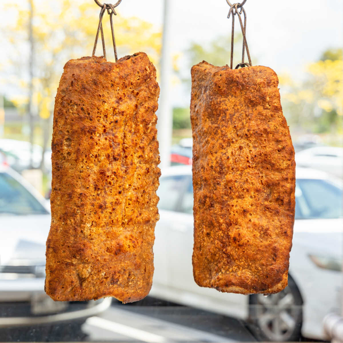 meat hanging in window