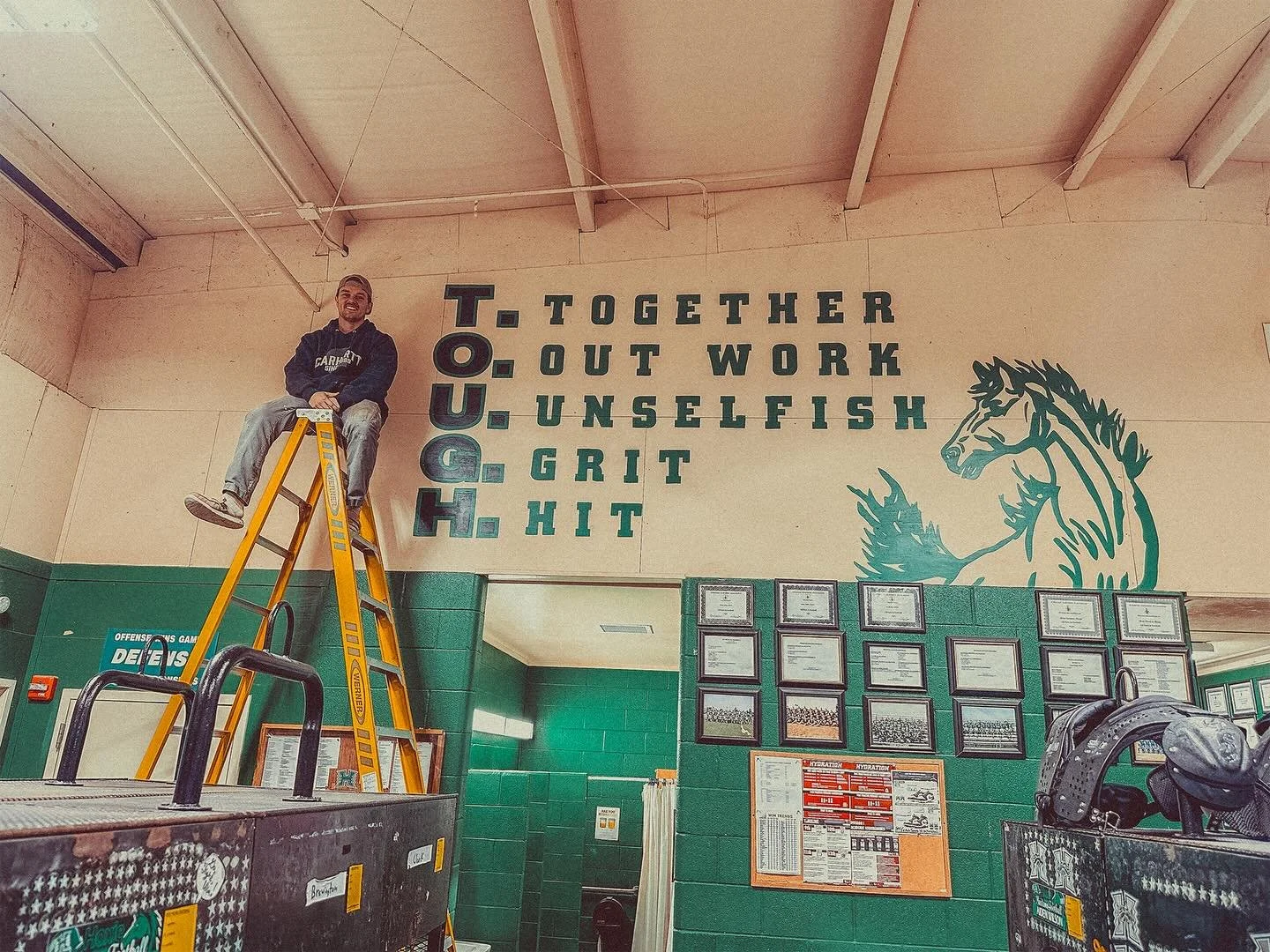 Excited to finally reveal these custom signs I painted for Coach Sears and the crew over at Hoxie High School.
There&rsquo;s something special about bringing that classic, bold energy into a space where the hard work actually happens.
Big thanks to t