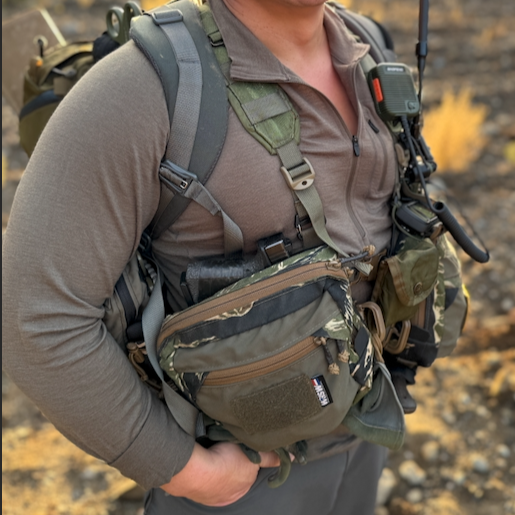 This is a picture of the designer wearing his chest rig that features a potbelly bag, which is one component of his Carry Systems sold on this website.