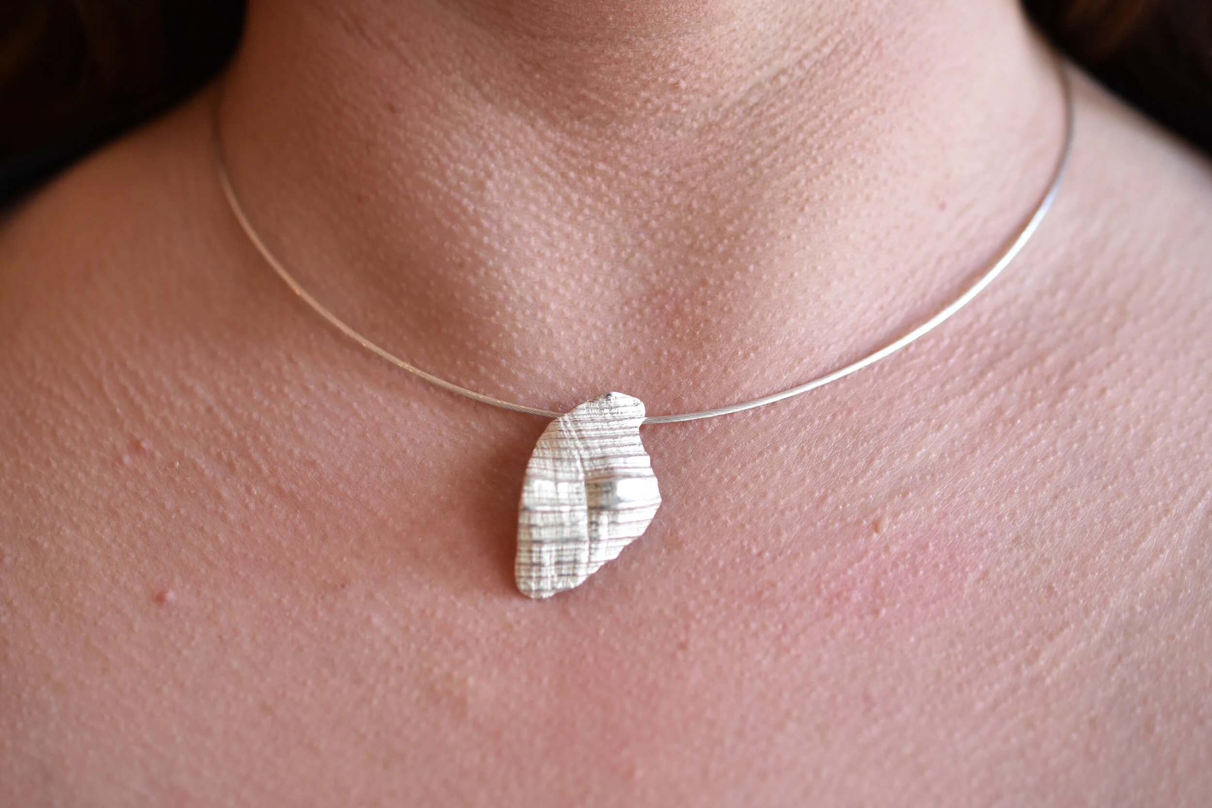 sterling silver shell fragment pendant