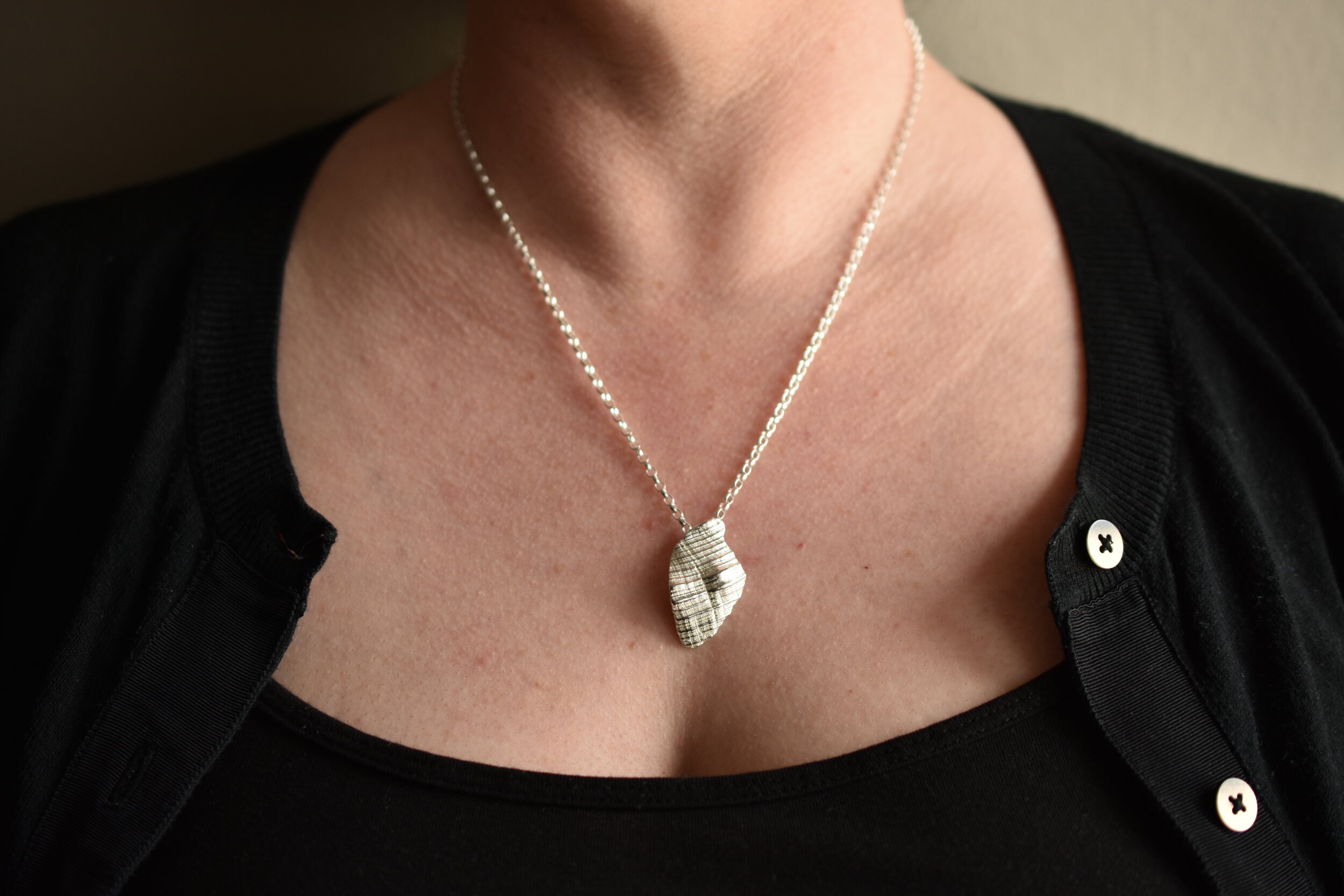 sterling silver shell fragment pendant