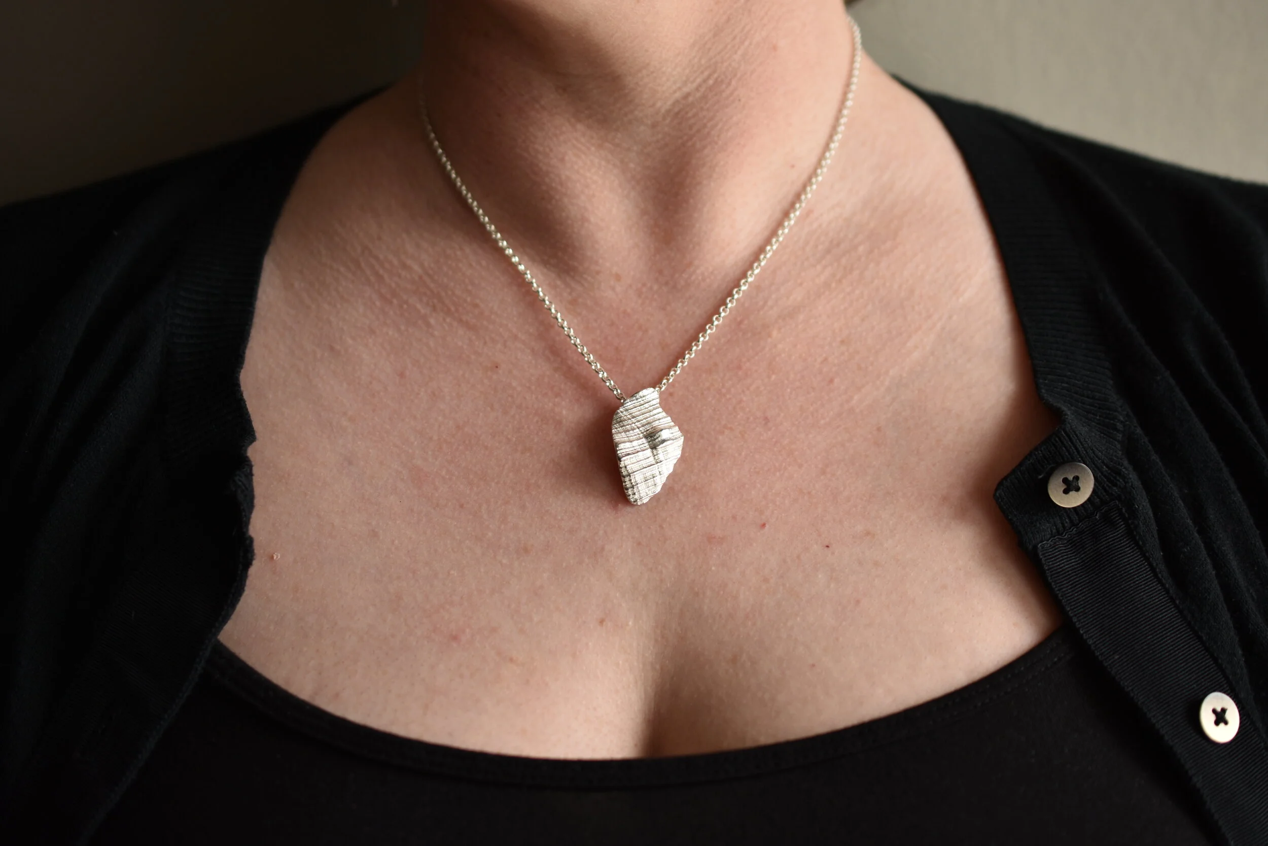 sterling silver shell fragment pendant