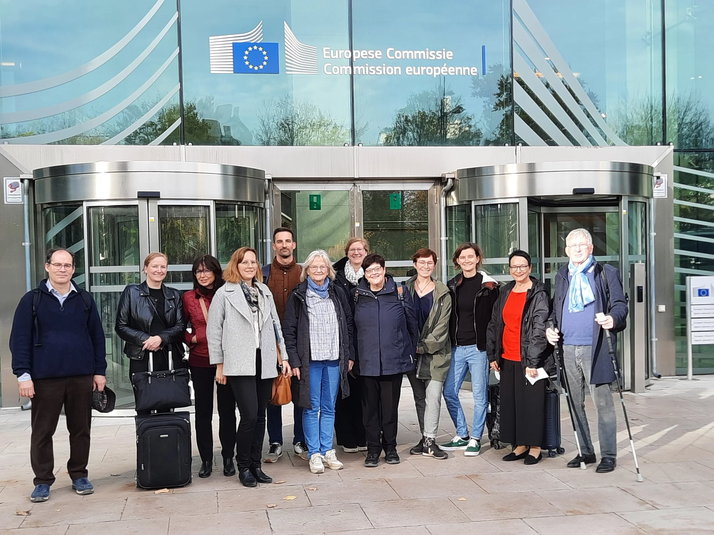 Research project team in front of the European Commission