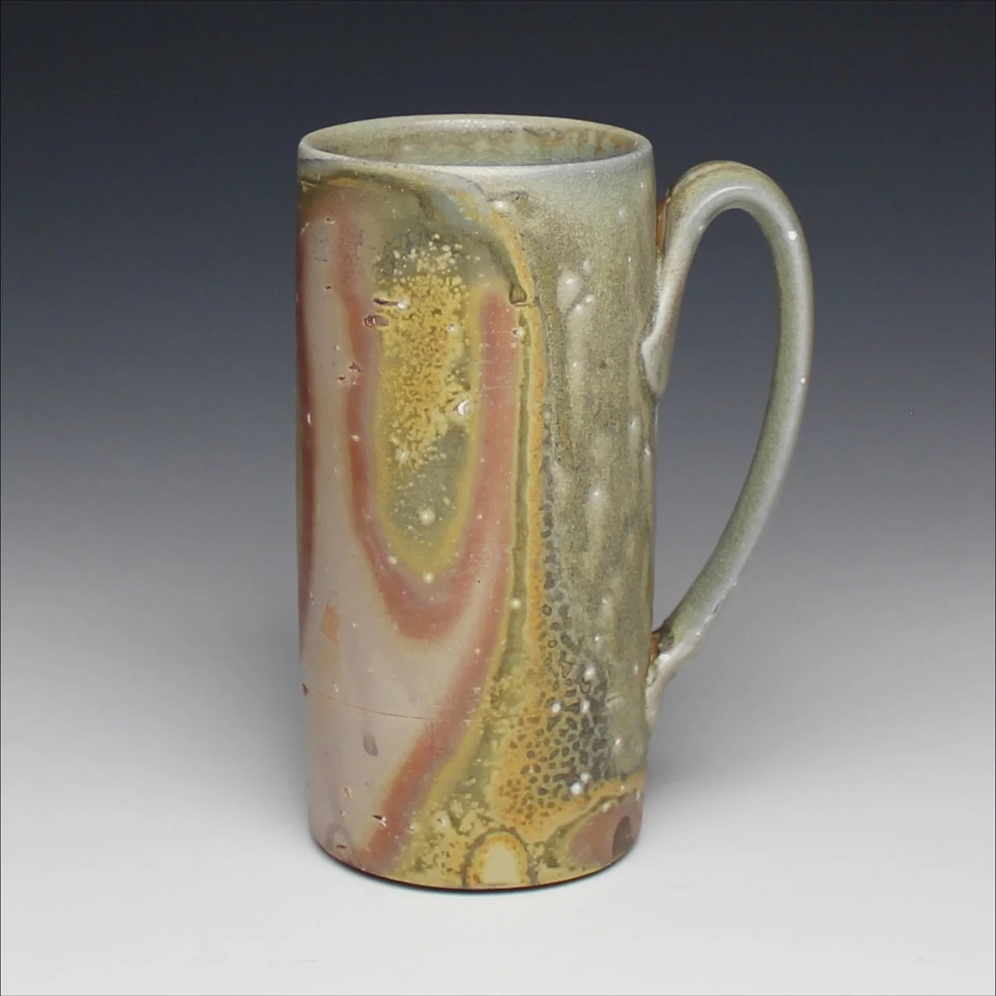 stein

I&rsquo;ve been incorporating terra sigillata into my work more recently. This xx sagger sig picked up on some flashing magic! Such thin skin of material with so much potential!

#sodafired
#terrasigillata