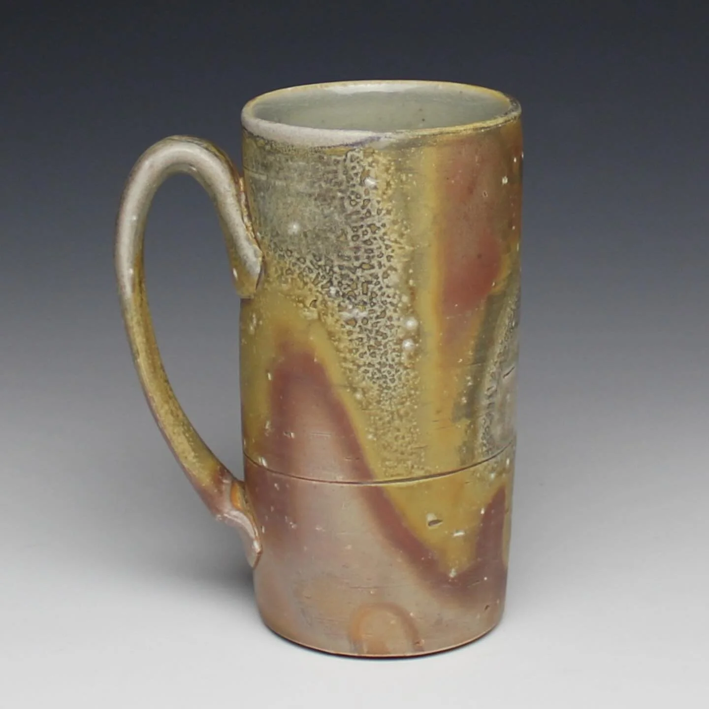 Purple and yellow stein. 
My feature at @artaxis is now live - I have a handful of very fine pots available. Link in my bio. 

#sodafired
#terrasigillata