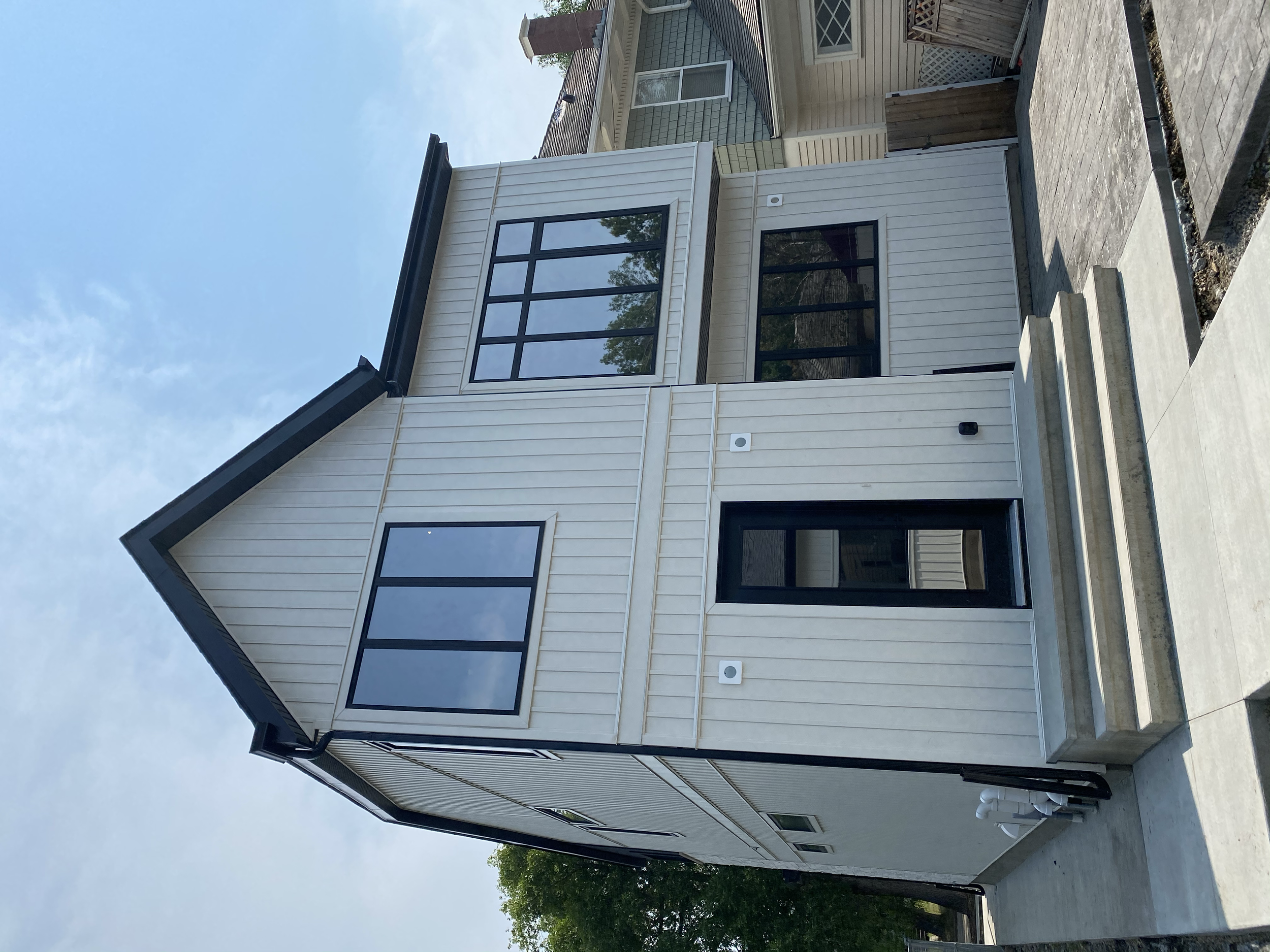 Exterior Film Vista NXA20 Top, NXA 35 Main Floor. Complemented this home beautifully!!