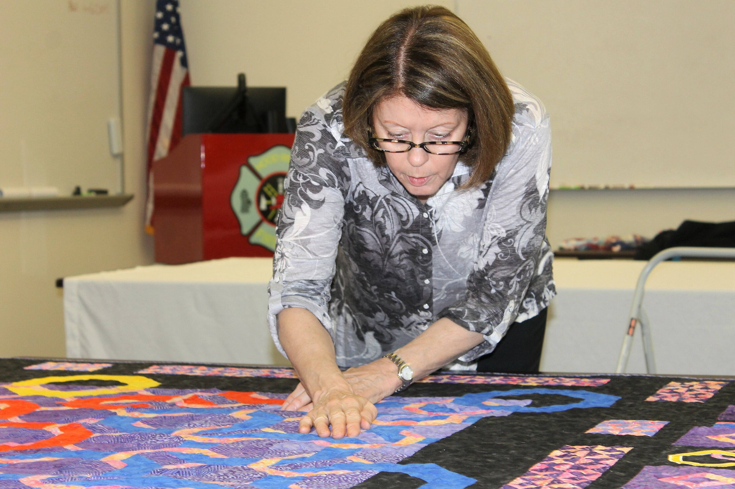 Judging-hands on the quilt.JPG