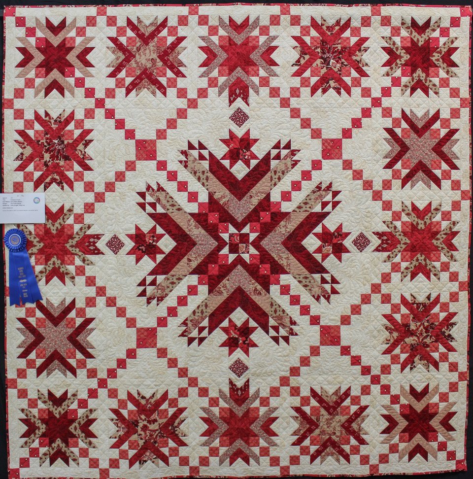 Large Pieced-1st Place: "Crimson Crown" by Anne Marie Martin
