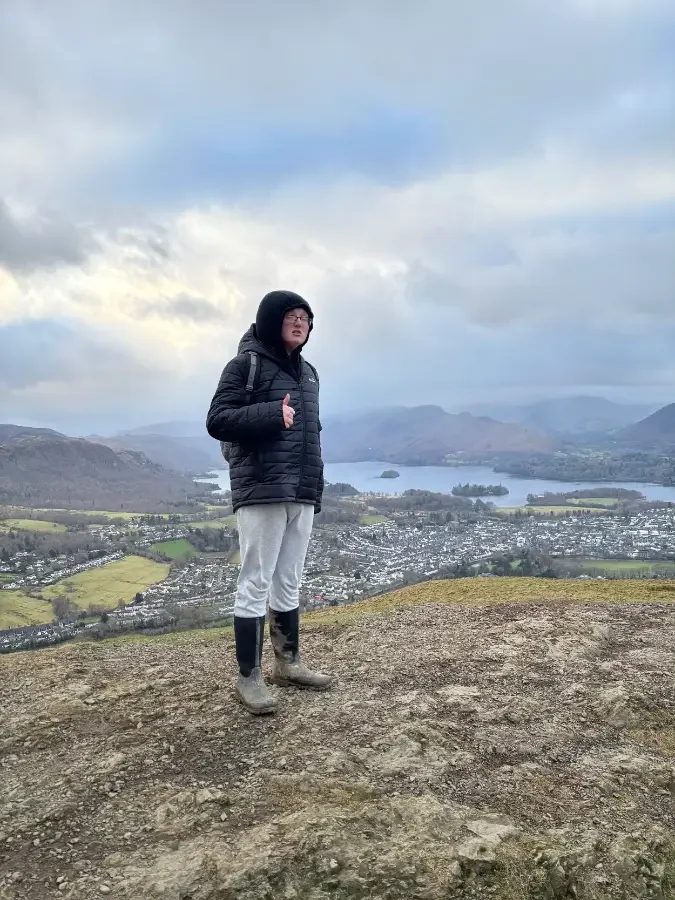 Jacob on Latrigg with Derwentwater and Keswick in the background