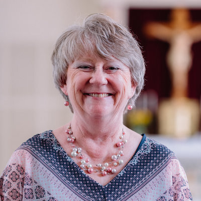 ‘Nell Reinberg ‘80 Assistant Director of Administration areinberg@aggiecatholic.org