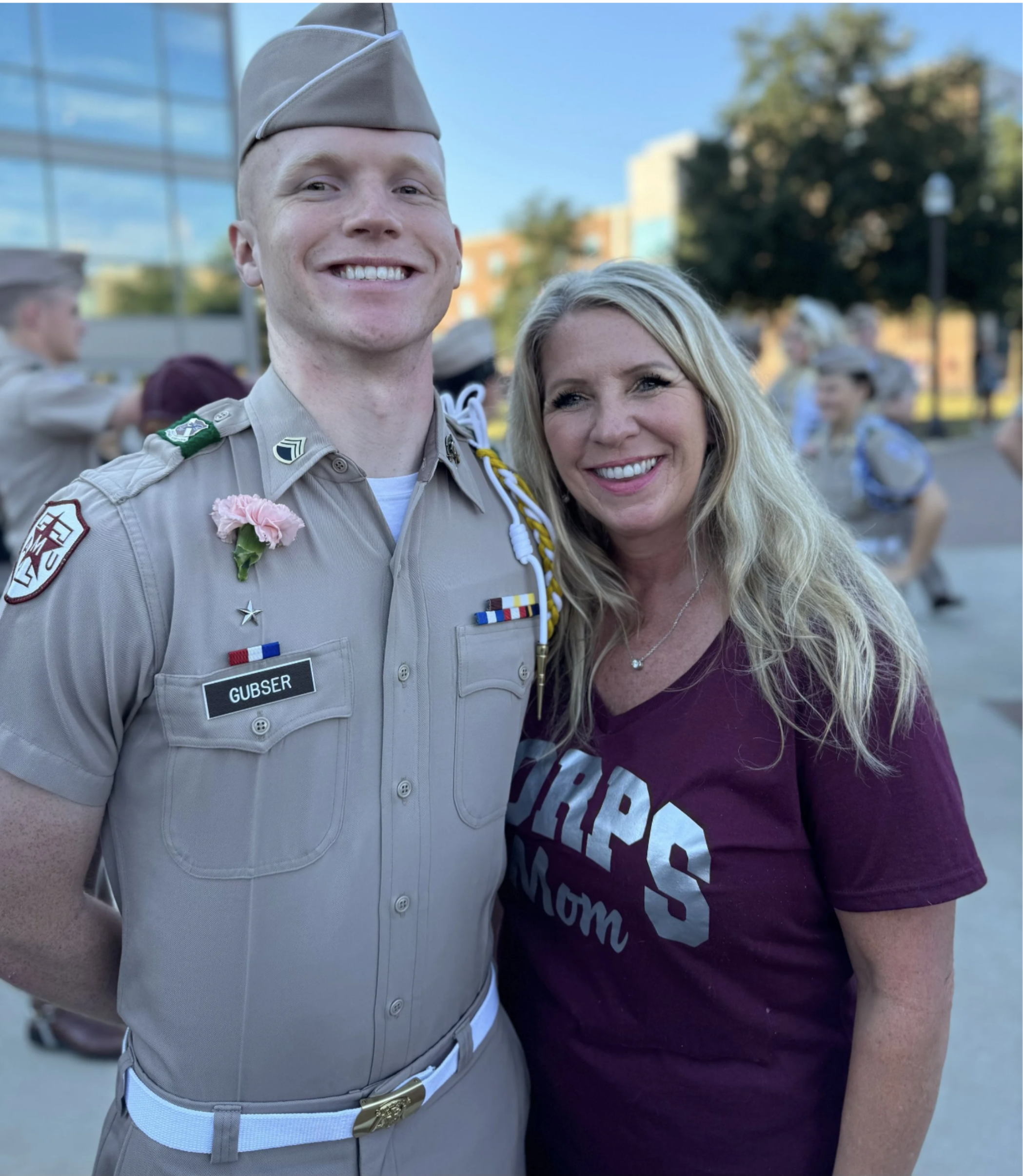 Mason before a march in with his Mom.