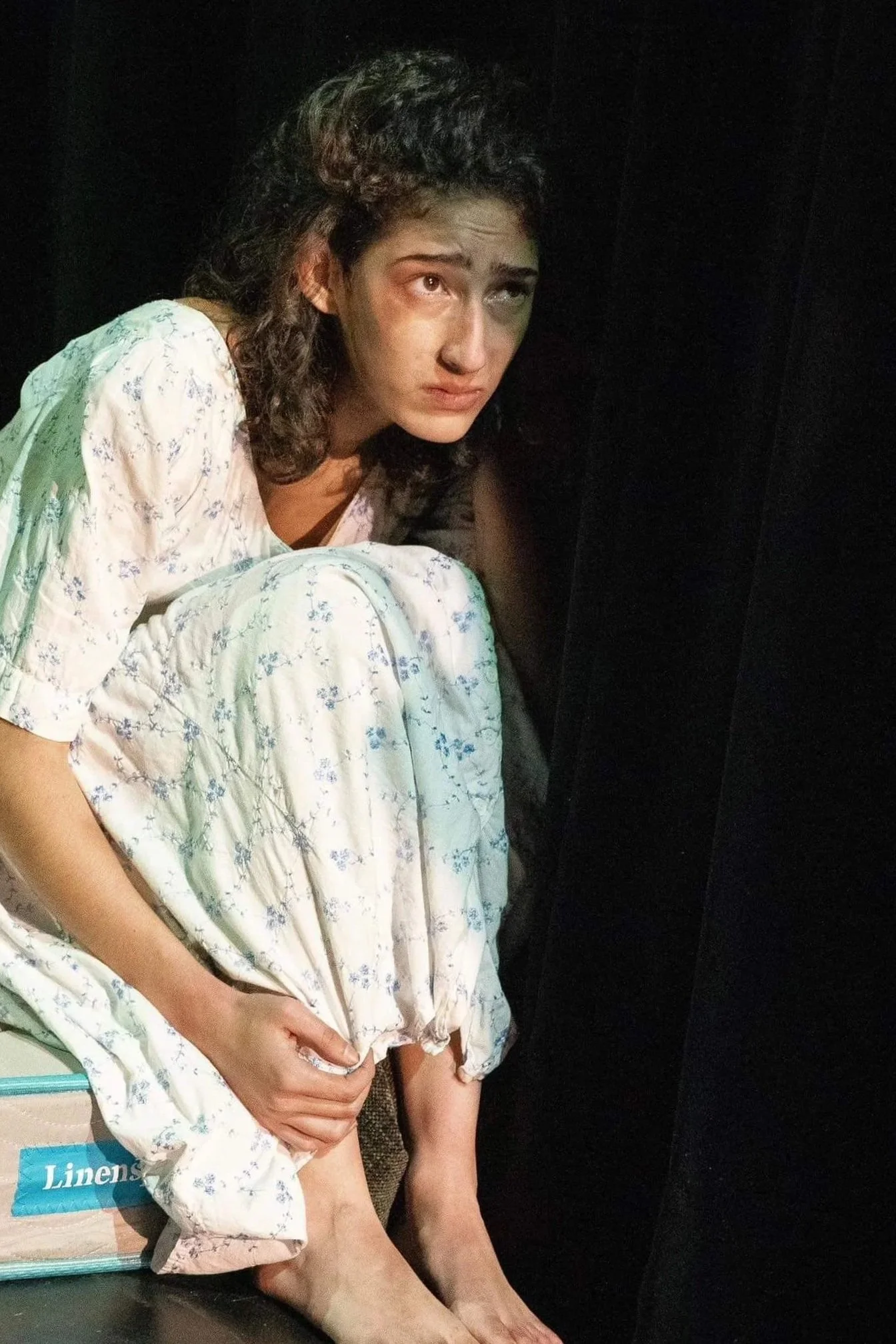 

Alum Sanise Lebron, onstage, SUNY Purchase