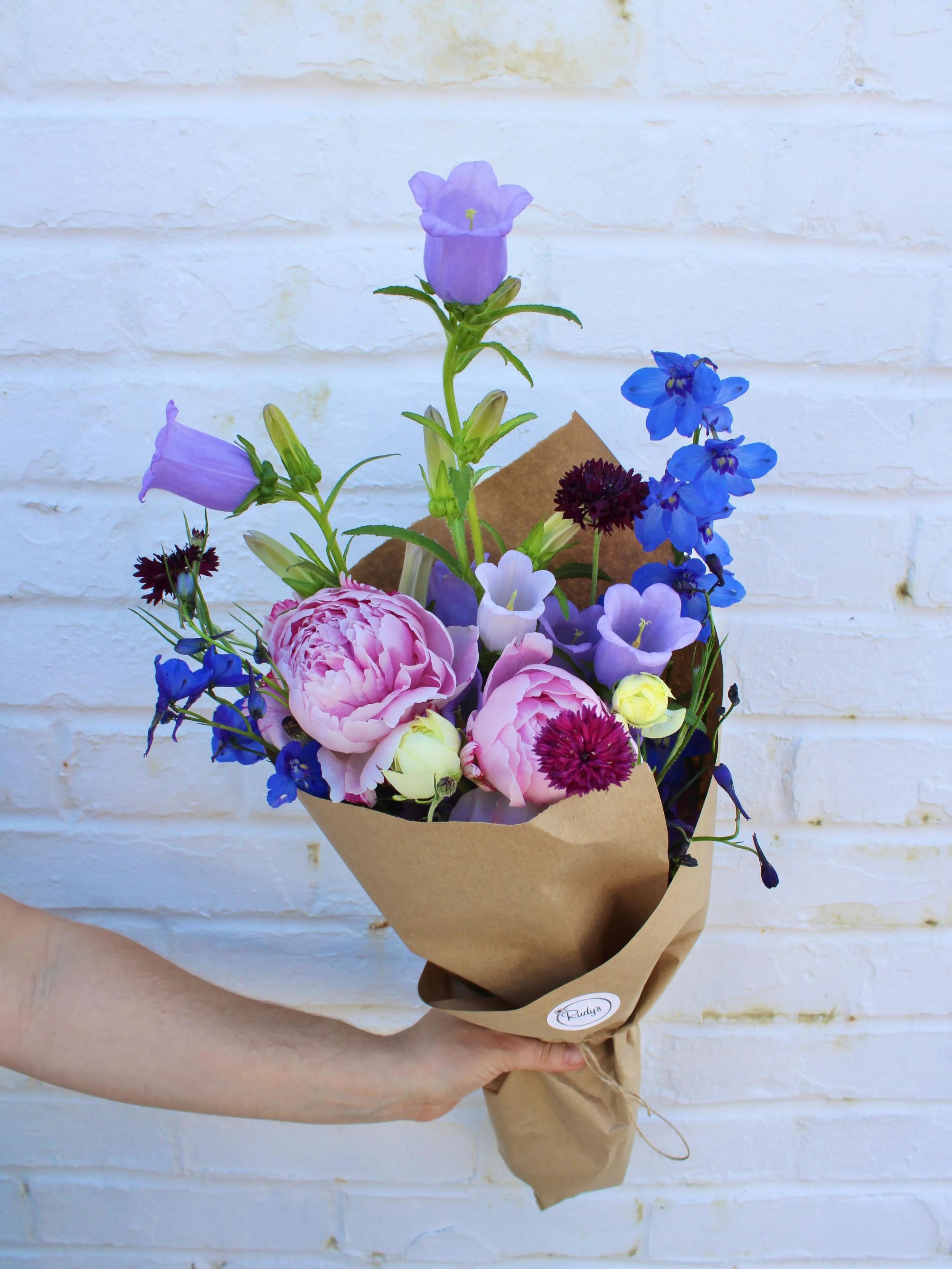 Our local bouquet got an update 😍 this week&rsquo;s local includes peonies, canterbury bells, ranunculus, delphinium, and cornflower. Grab the freshest blooms of the season today!
