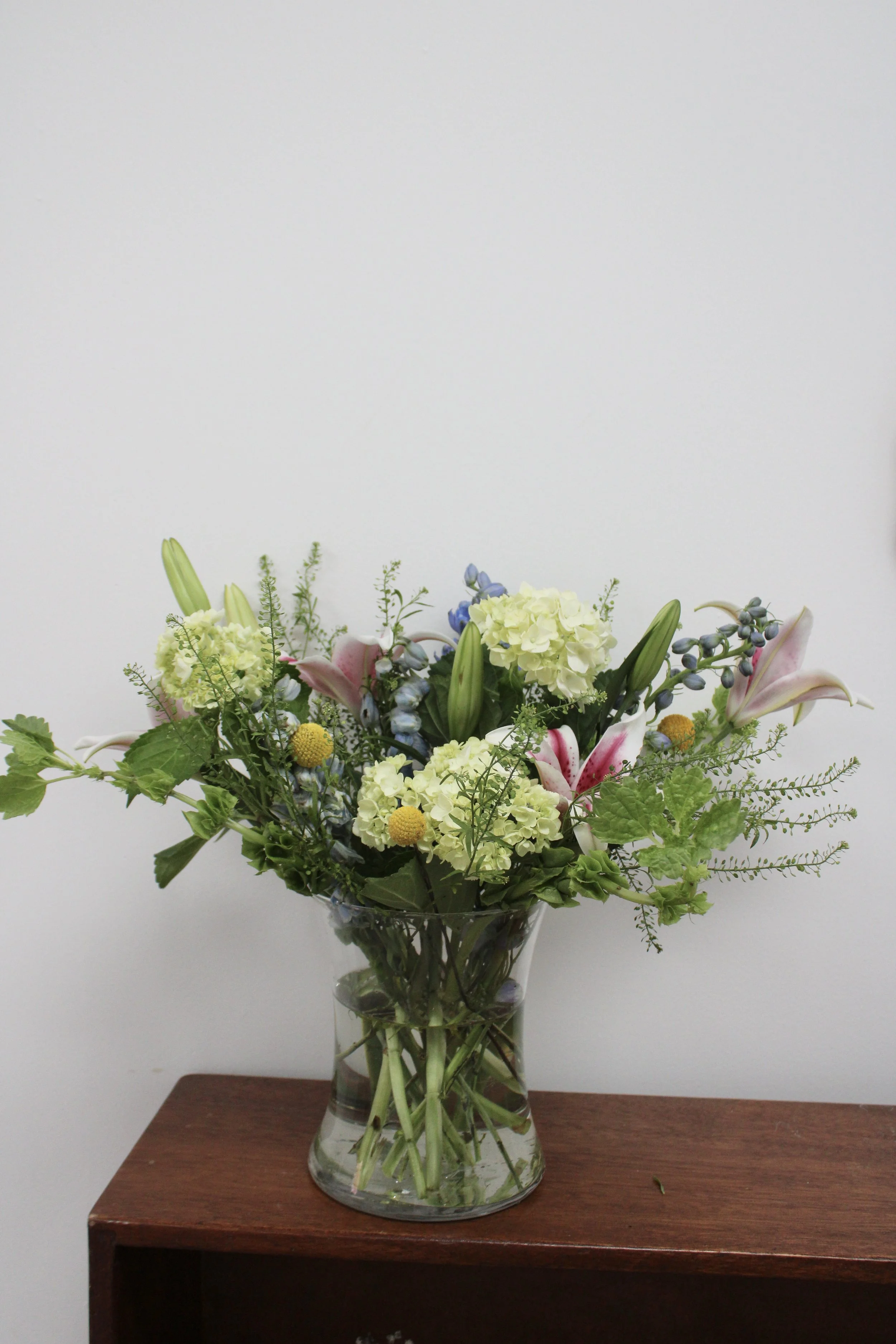 modern luxury flower arrangement, vase filled with hydrangeas, lilies, roses, stl florist, stl flower delivery